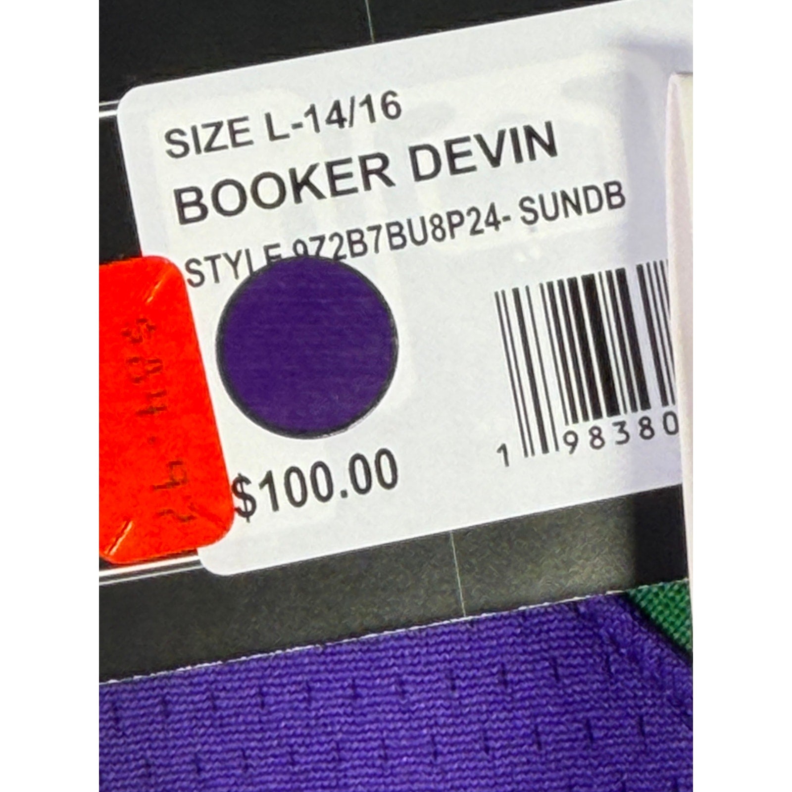 Nike Phoenix Suns Devin Booker #1 youth jersey in purple, size L 14/16, featuring team logo and player number.