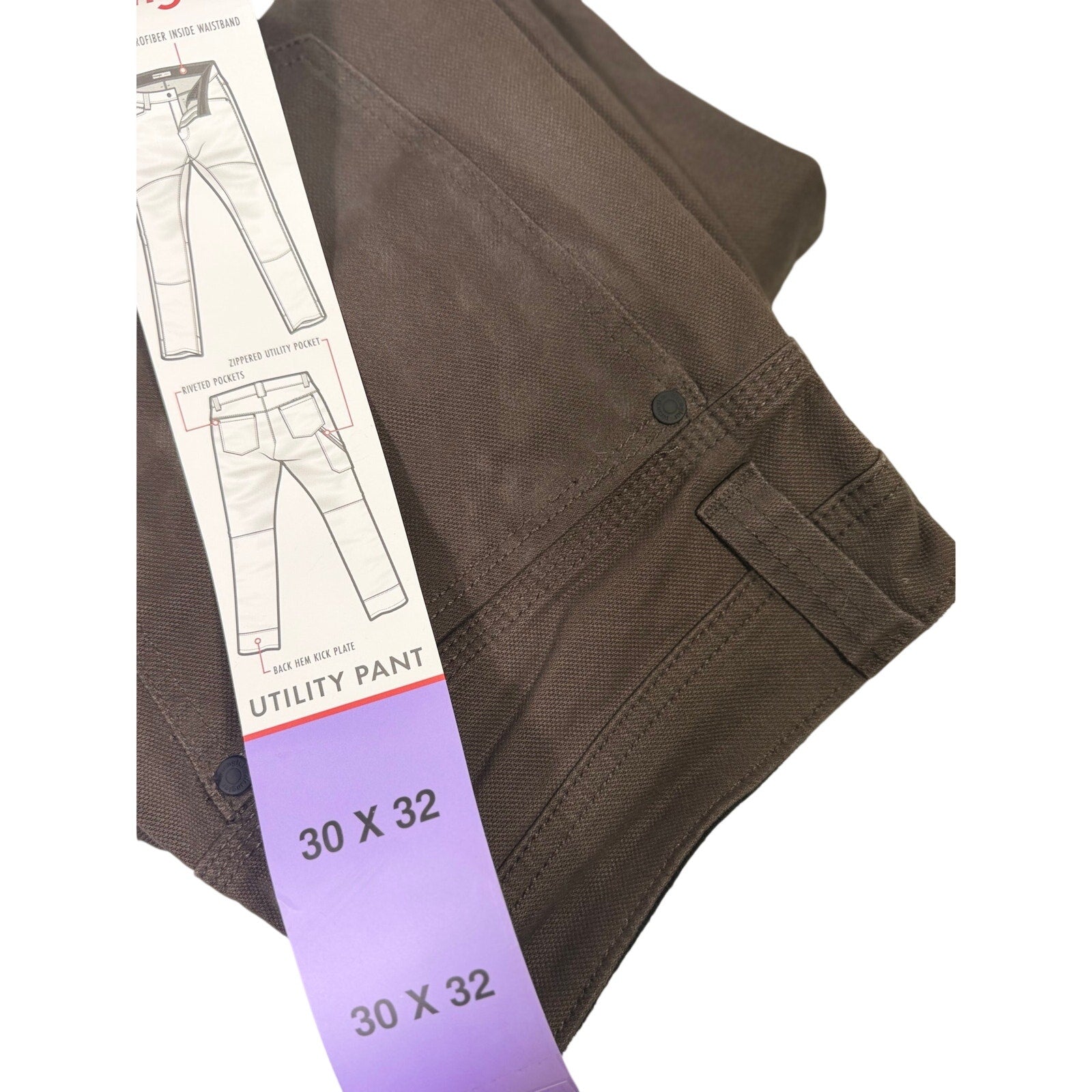 Wrangler men's brown utility work pants, size 30x32, made of durable fabric with multiple pockets and a relaxed fit.