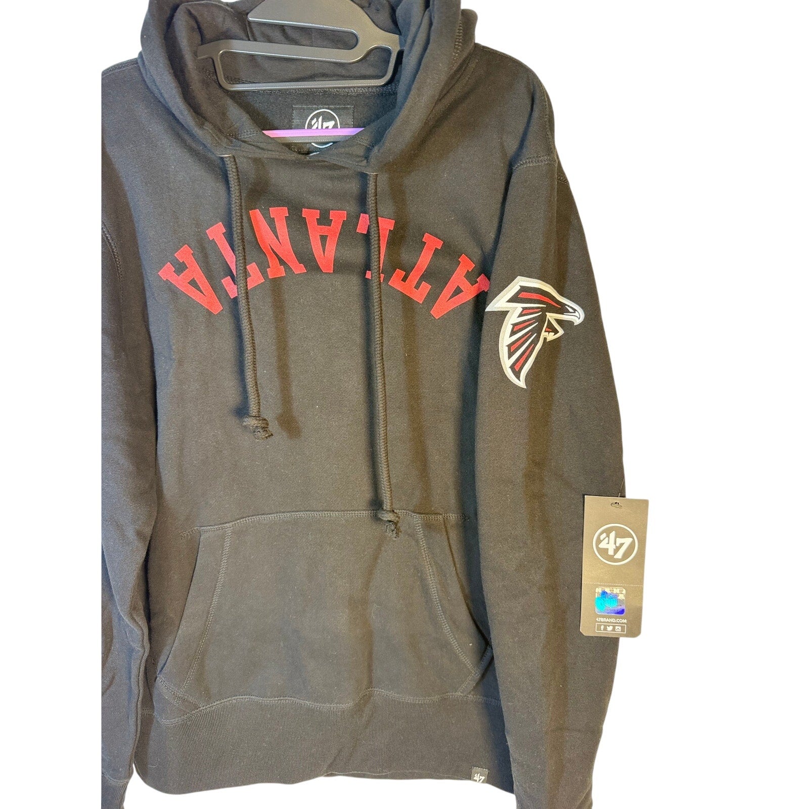 Black men's 47 Brand Atlanta Falcons hoodie with NFL fleece material, pullover style, small size, hooded, new with tags.