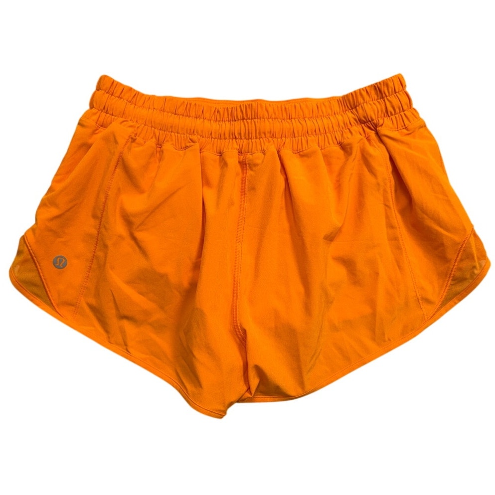 Lululemon Hotty Hot low-rise 2.5-inch lined athletic shorts for women, shown in a vibrant color with waistband and lining details.