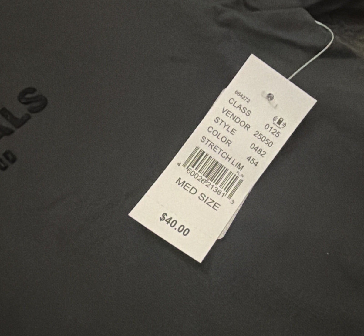 Black Essentials Fear of God men's logo T-shirt, size M, laid flat showing front design and fit.