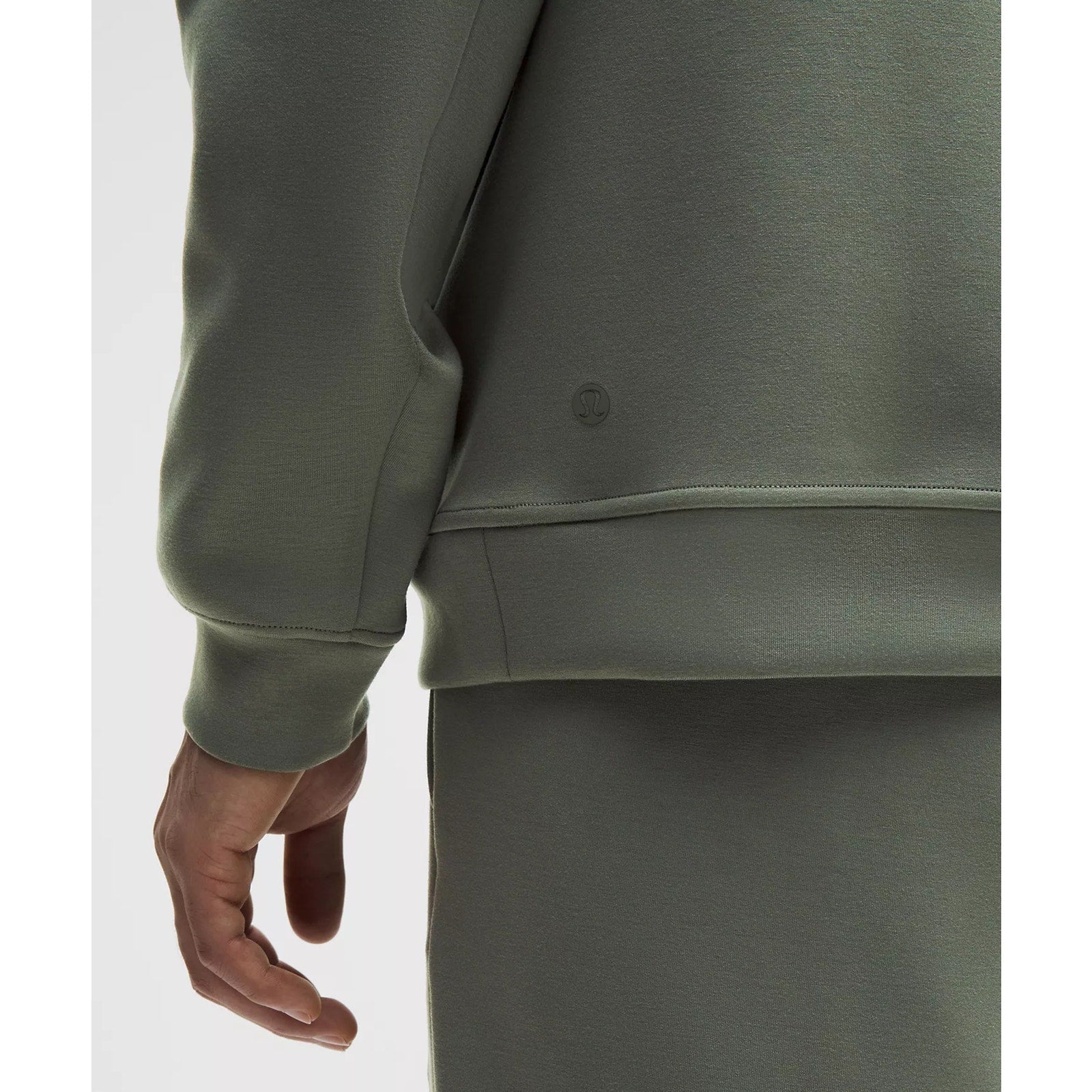 Men's green Lululemon Smooth Spacer Quarter Zip sweatshirt in XXL, showing the quarter zip neckline and comfortable fit.