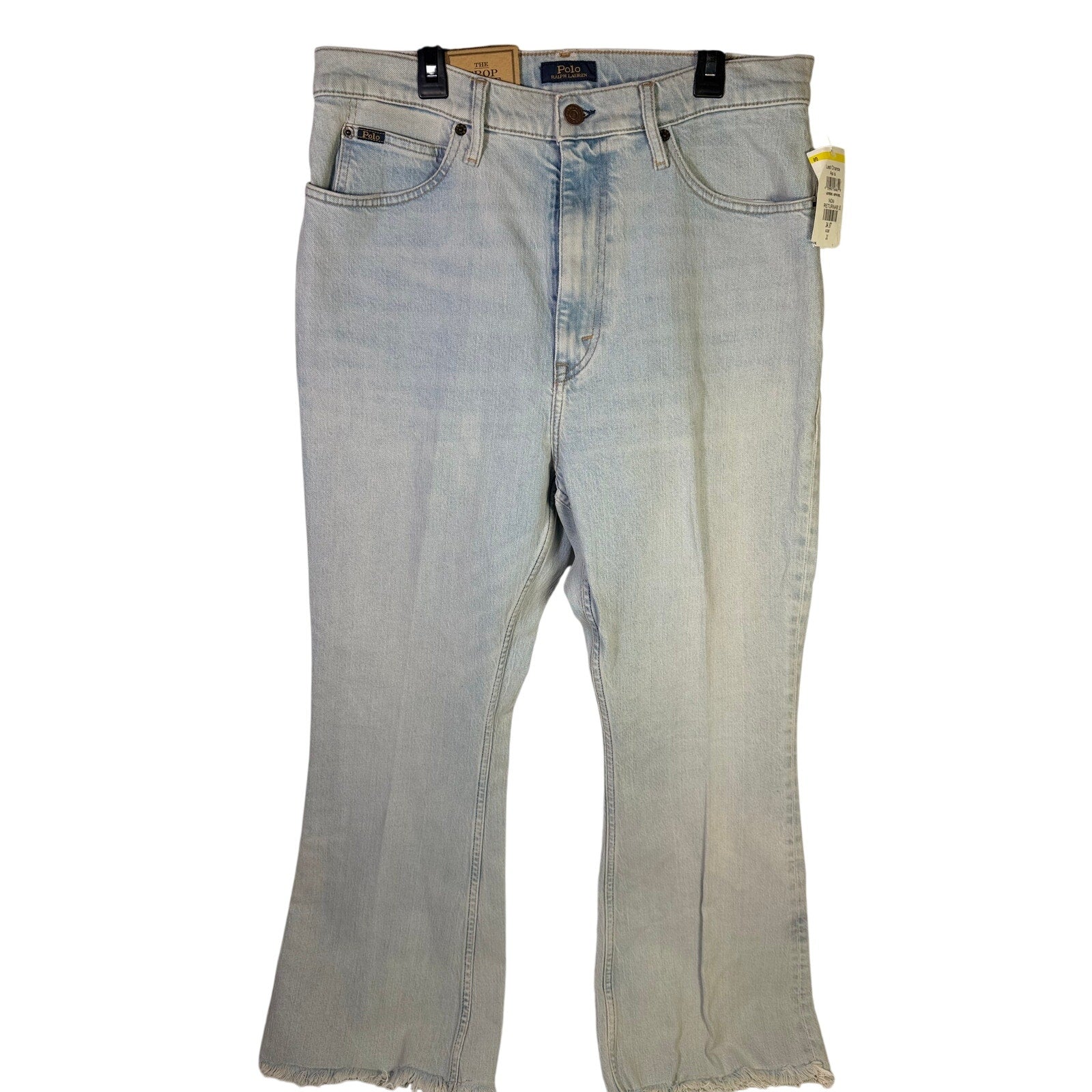 Light wash Polo Ralph Lauren women's crop flare jeans with raw hem, size 31, displayed flat.