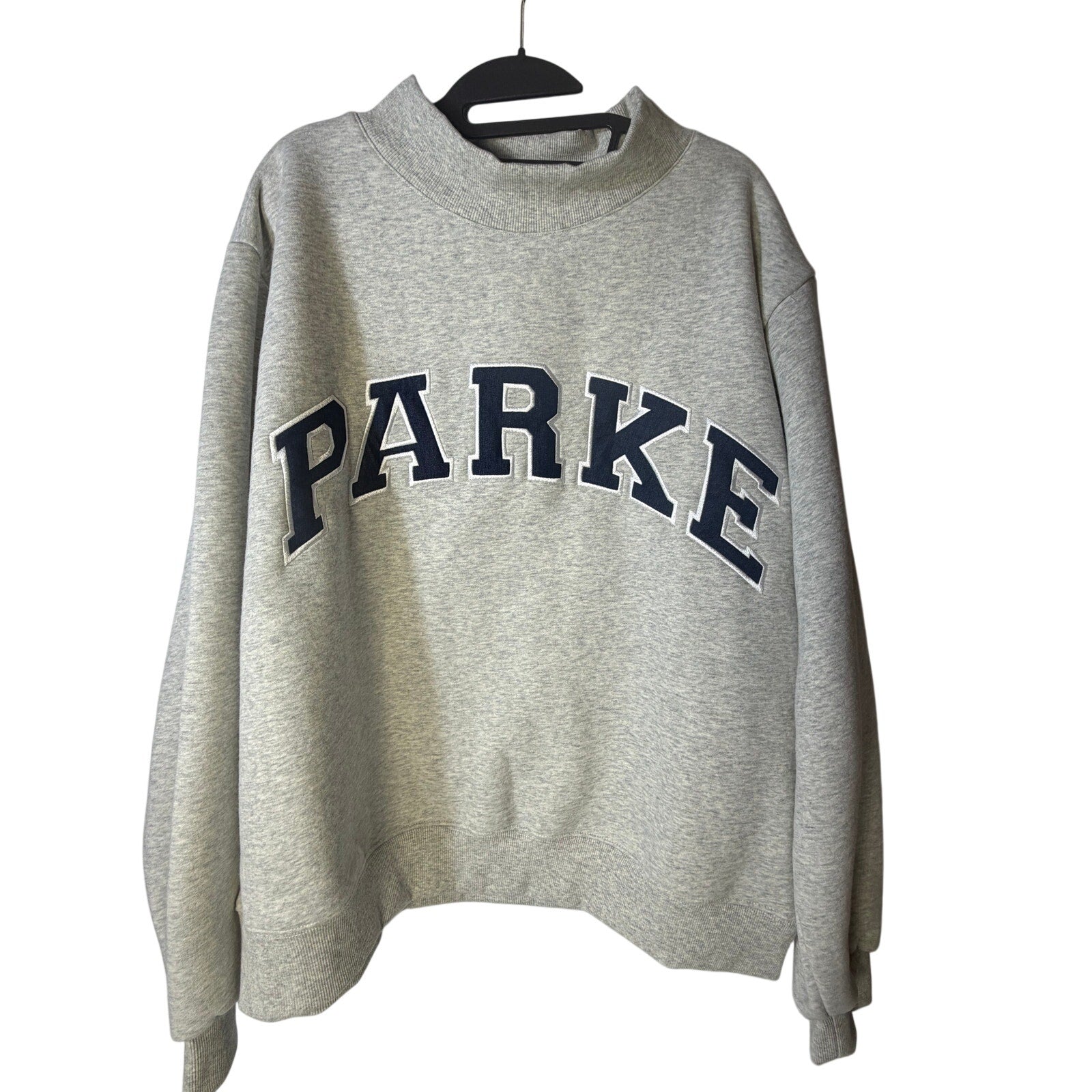Gray PARKE women's oversized fleece sweatshirt with a mock neck and embroidered logo, L/XL size, comfortable pullover style.