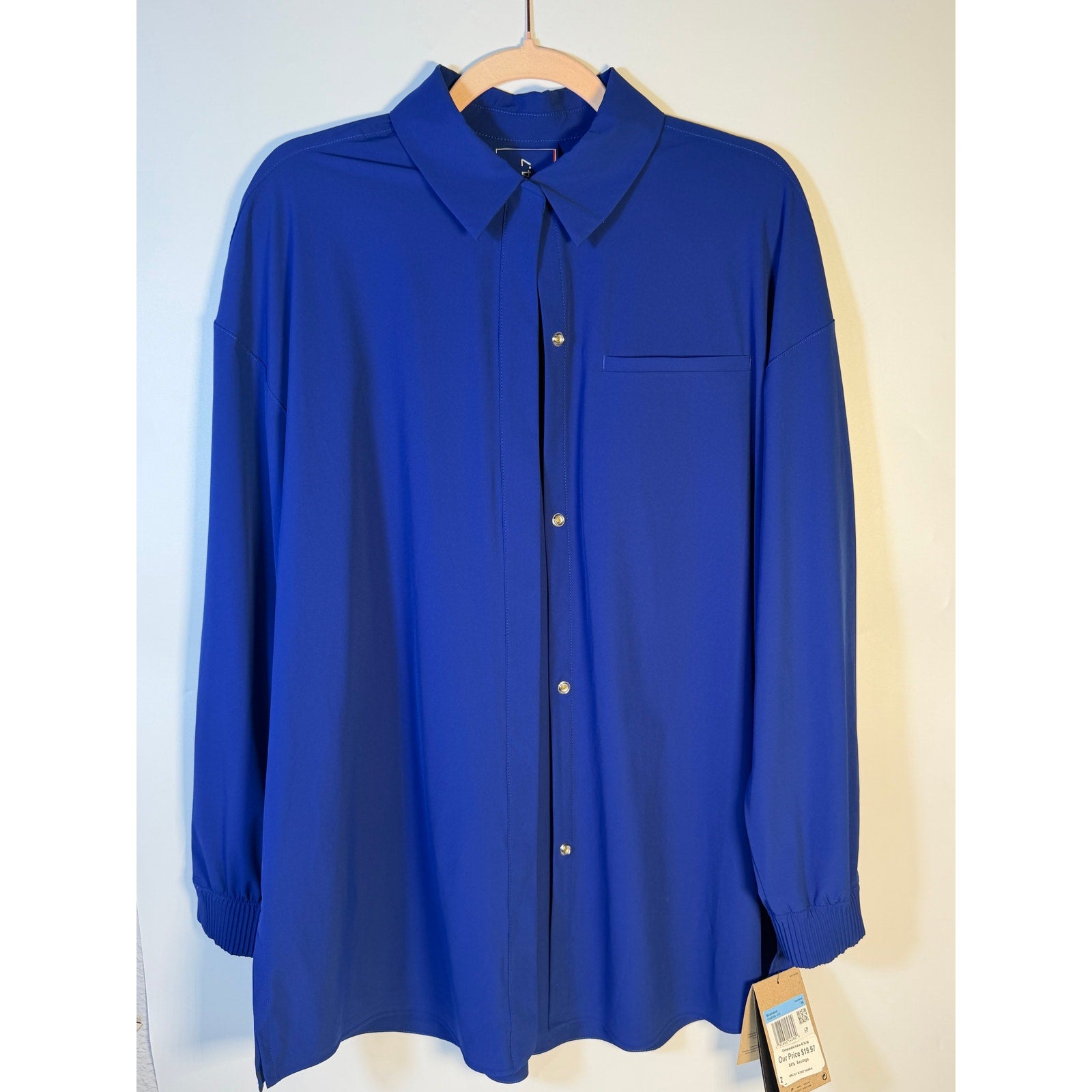 Nike 24.7 Women's blue Dri-FIT training button-front shirt, medium size, lightweight athletic top for women.