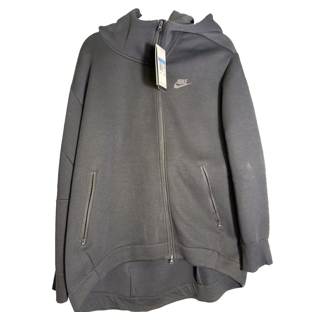 Nike Sportswear Tech Fleece women's oversized full-zip hoodie in black, front view showing the Nike logo and zip closure.