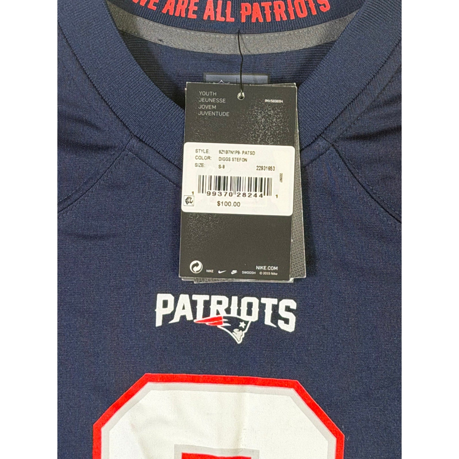 Nike youth New England Patriots Stefon Diggs #8 navy game jersey, size small, detailed view of front and team logo.