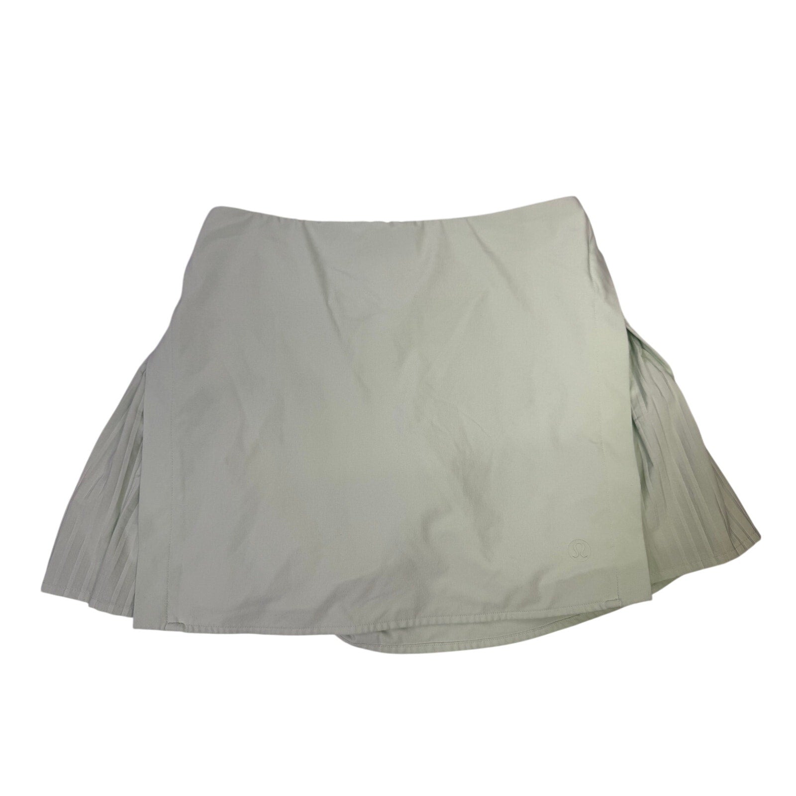 Lululemon women's light mint pleated tennis skort with built-in shorts, size 6, featuring a sporty and stylish design.