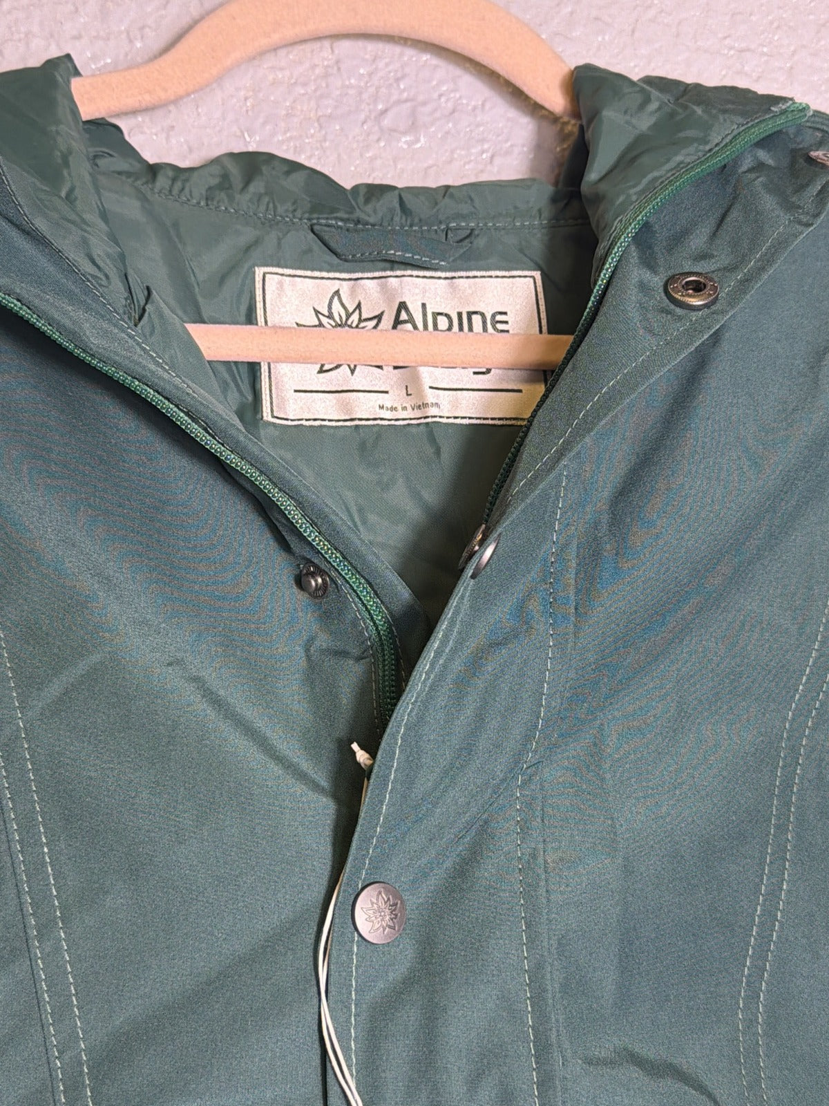 Men's Alpine Design 1962 Anorak pullover hooded jacket in forest shadow green, size large, shown with front view.