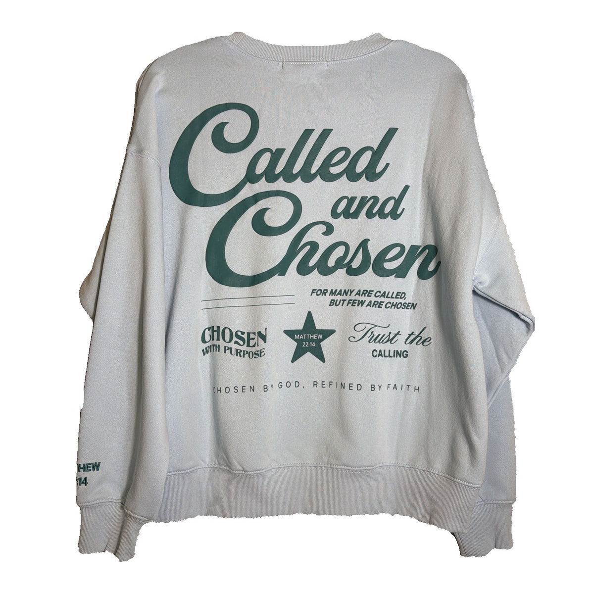 Light blue Revival Club women's crewneck sweatshirt featuring the "Called and Chosen Matthew 22:14" design, casual and comfortable.