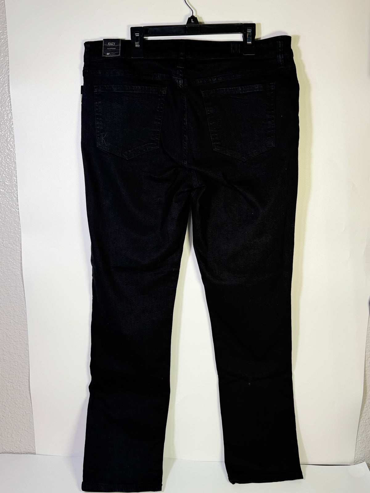 KUT from the Kloth black straight leg jeans for women, size 12, featuring classic denim fabric and a fitted waistband.