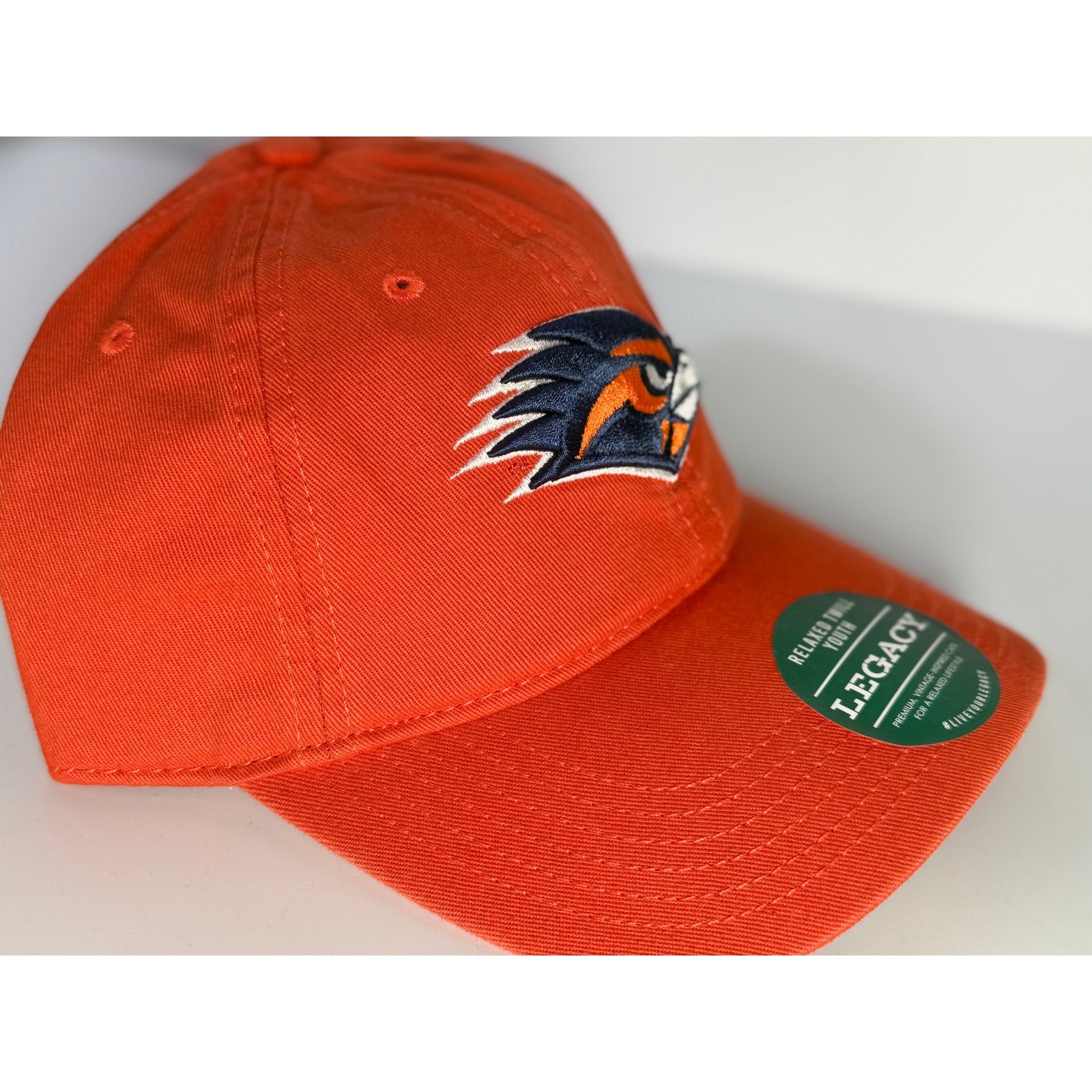 Legacy UTSA Roadrunners youth adjustable relaxed twill hat in orange with team logo, NCAA college sports cap for kids.