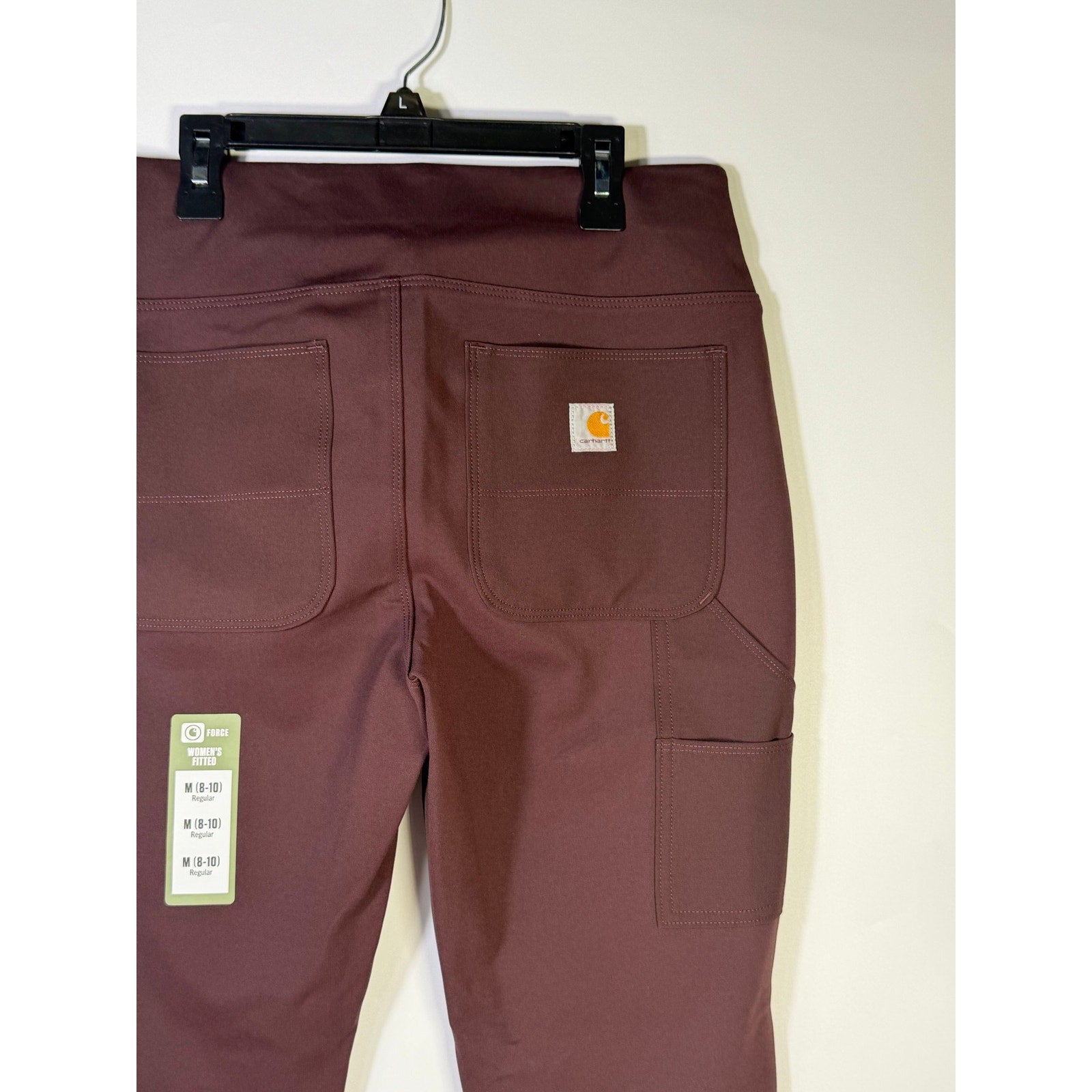 Carhartt Force women’s fitted utility pants in size 8-10, regular fit, brown color, shown on a model.