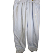 Women's Nike Sportswear Phoenix Fleece high-waisted oversized light blue sweatpants, XL, with relaxed fit and soft fleece material.