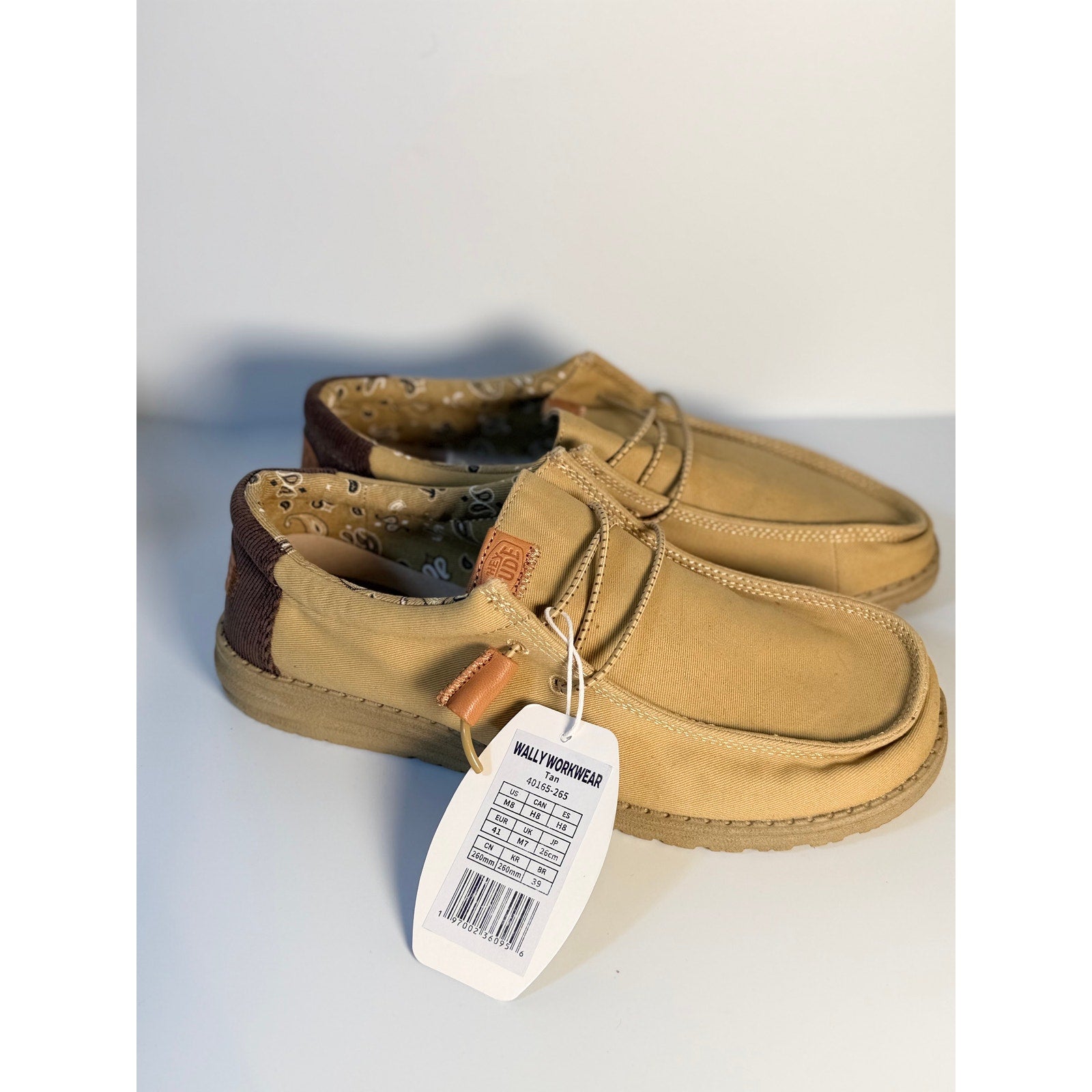 Hey Dude Wally Workwear loafers in tan, lightweight men's US 8 and women's US 10, casual slip-on footwear with a comfortable design.