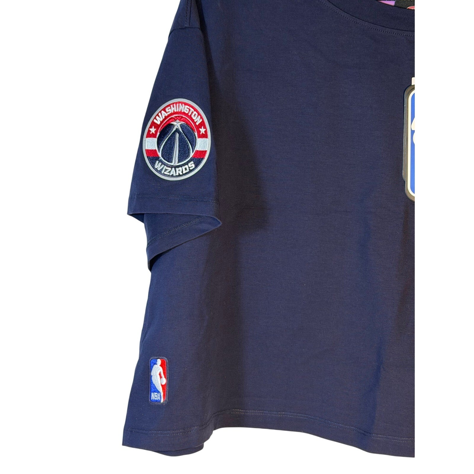 Women's XL Pro Standard Washington Wizards crop top with rhinestone team logo, featuring a stylish graphic design.