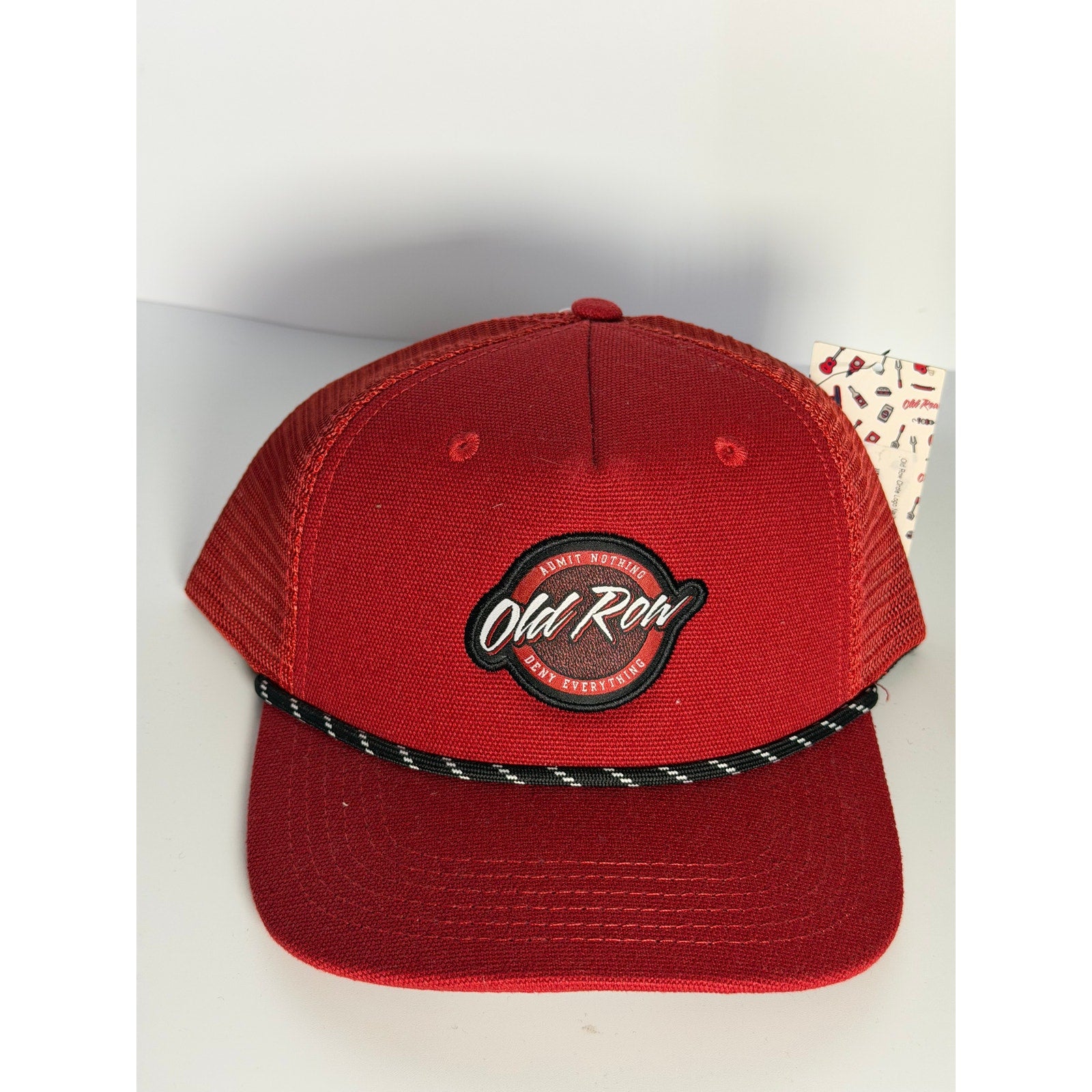 Old Row Red Rope Trucker Snapback Hat with adjustable strap, featuring a classic design and bold red rope detail on the front.