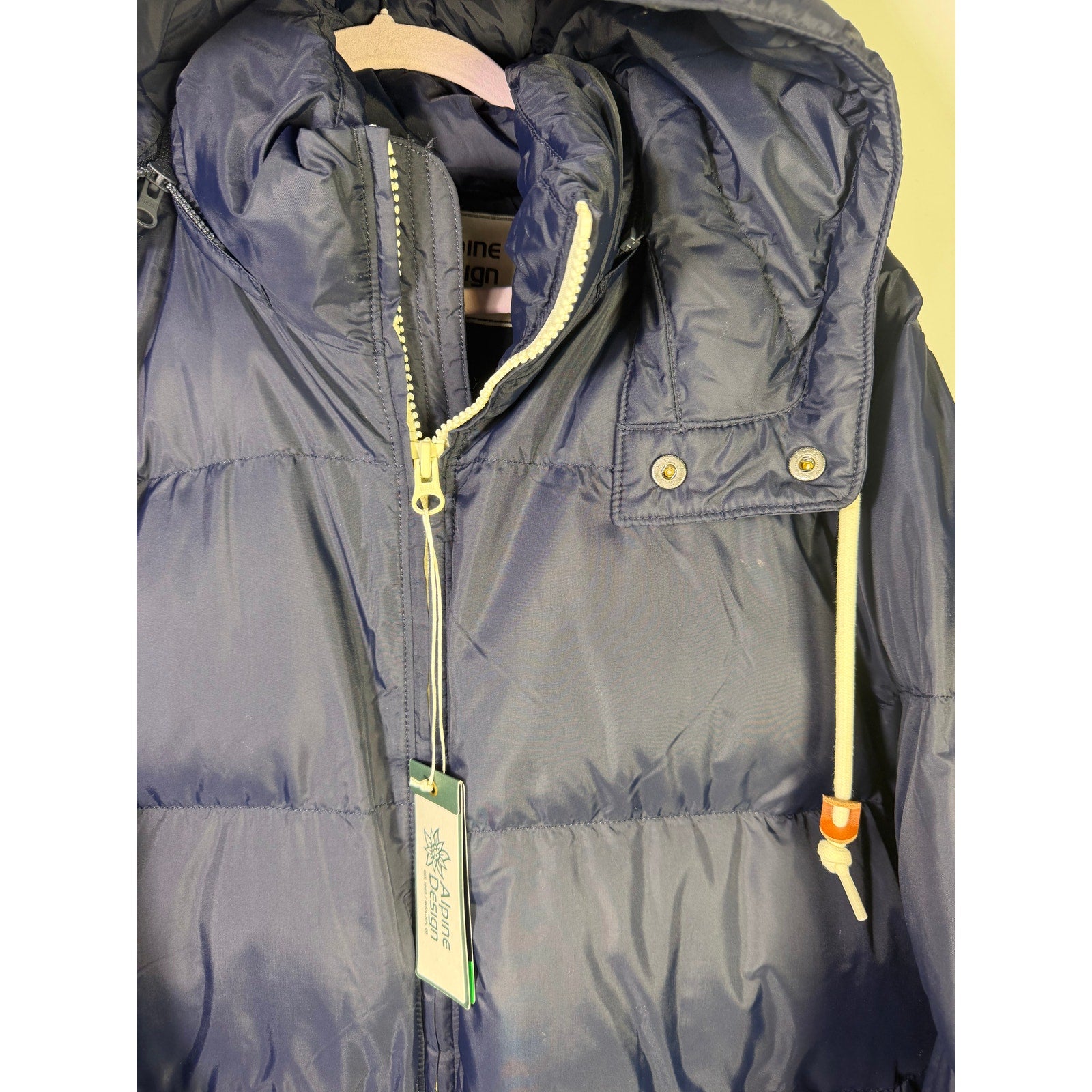 Alpine Design men's AD 1962 hooded puffer jacket in deep navy, size L, featuring a quilted design and front zipper.