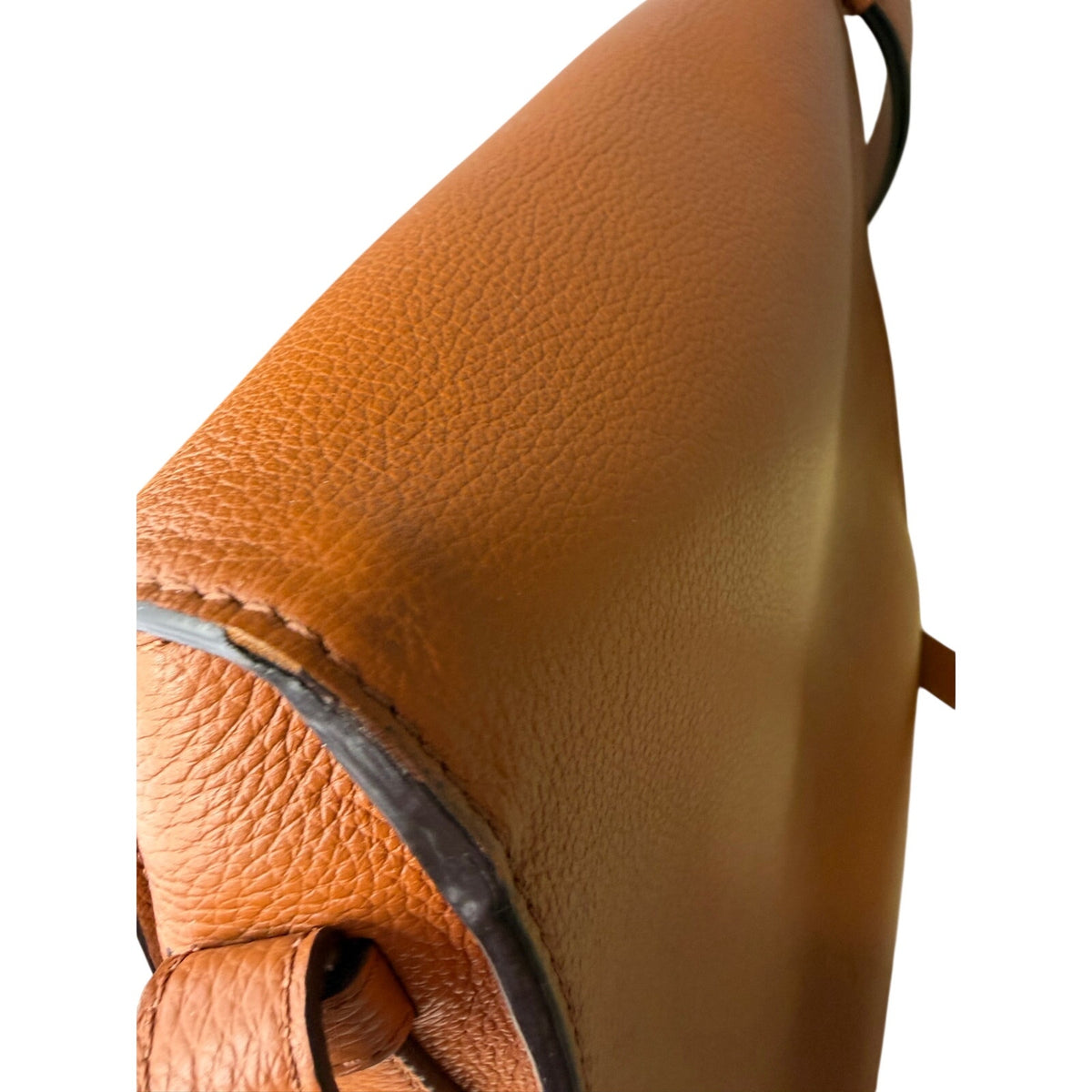 Chloé Marcie medium saddle crossbody bag in brown grained calfskin leather with gold hardware, featuring adjustable strap and classic design.