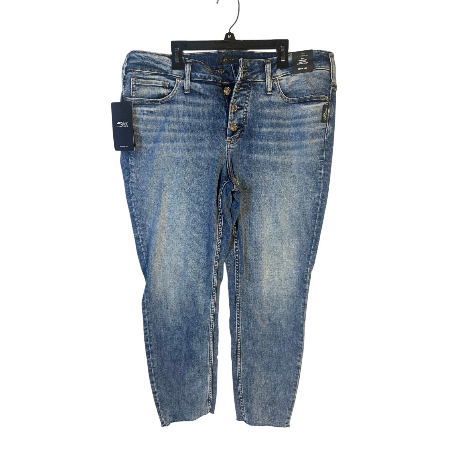 Silver Jeans Co. Suki curvy fit mid-rise skinny crop jeans for women, size 14W, shown laid flat in natural light.