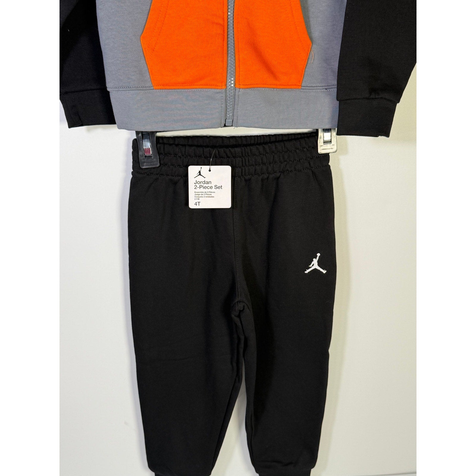 Jordan boys 2-piece hoodie and jogger pants set in gray, black, and orange, size 4T, new with tags.