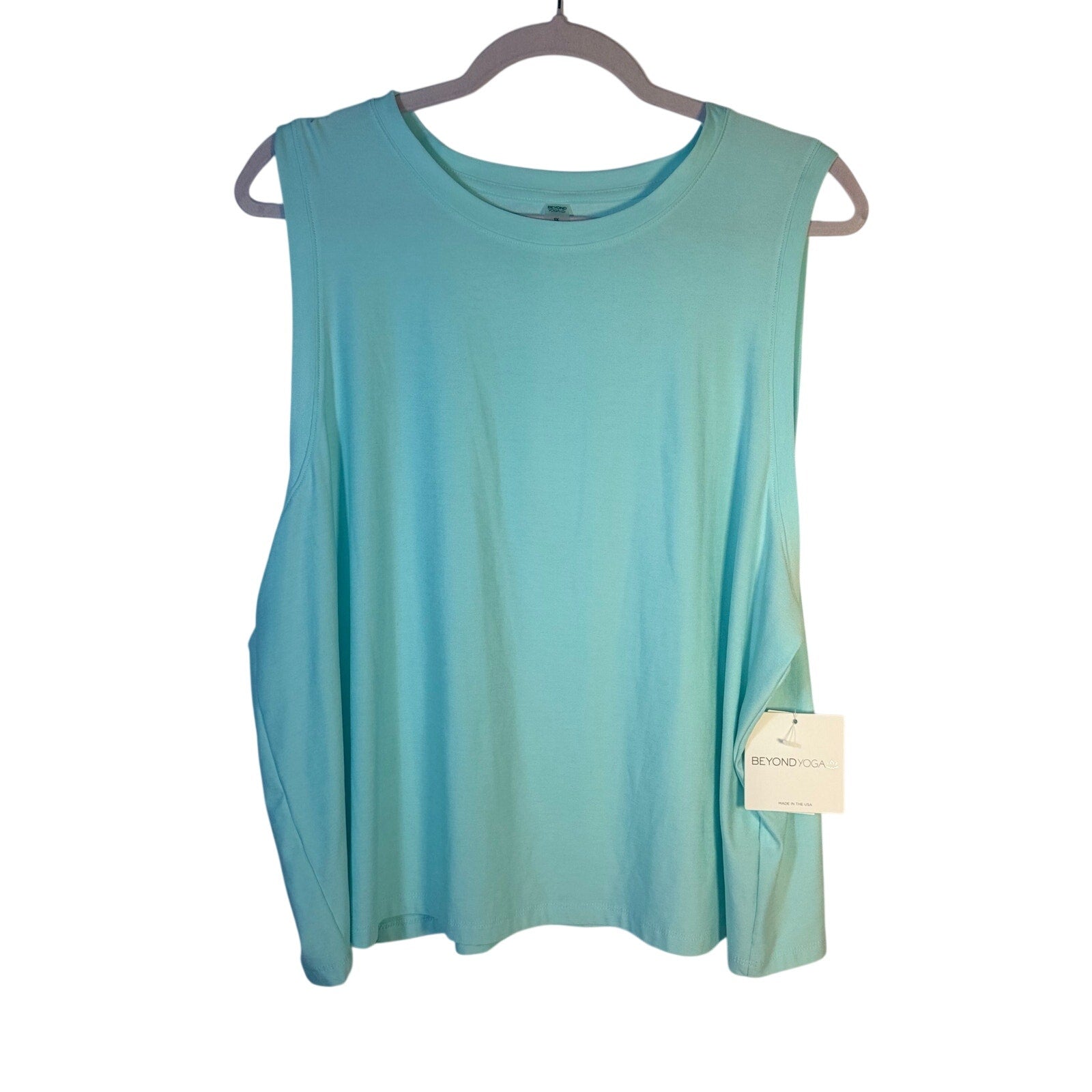 Beyond Yoga women's green sleeveless tank top, new with tags, casual athletic wear, lightweight and comfortable fit.