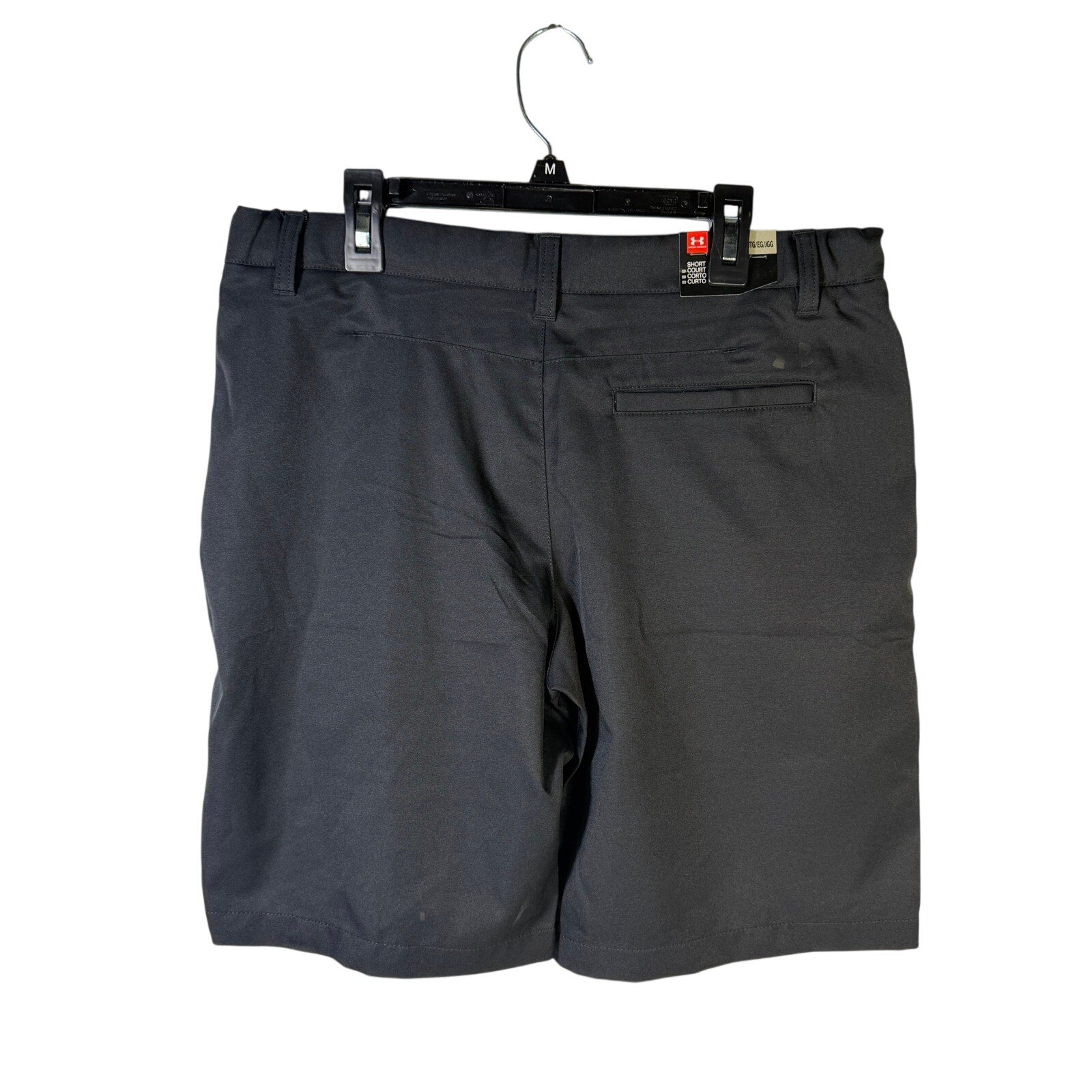 Under Armour Youth Boys Match Play Golf Shorts in black, performance stretch fabric, showing the shorts laid flat.