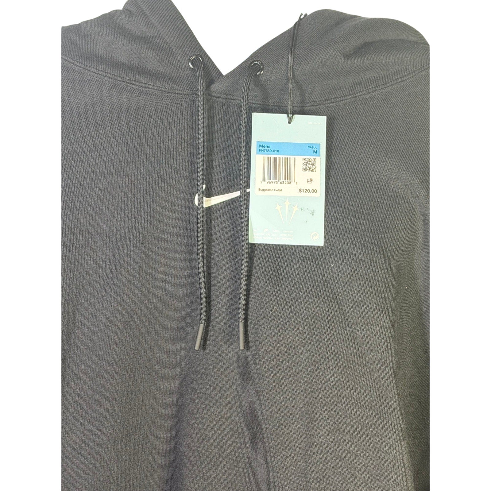 Nocta men's black fleece hoodie with tags, size M, soft and cozy casual sweatshirt for everyday wear.