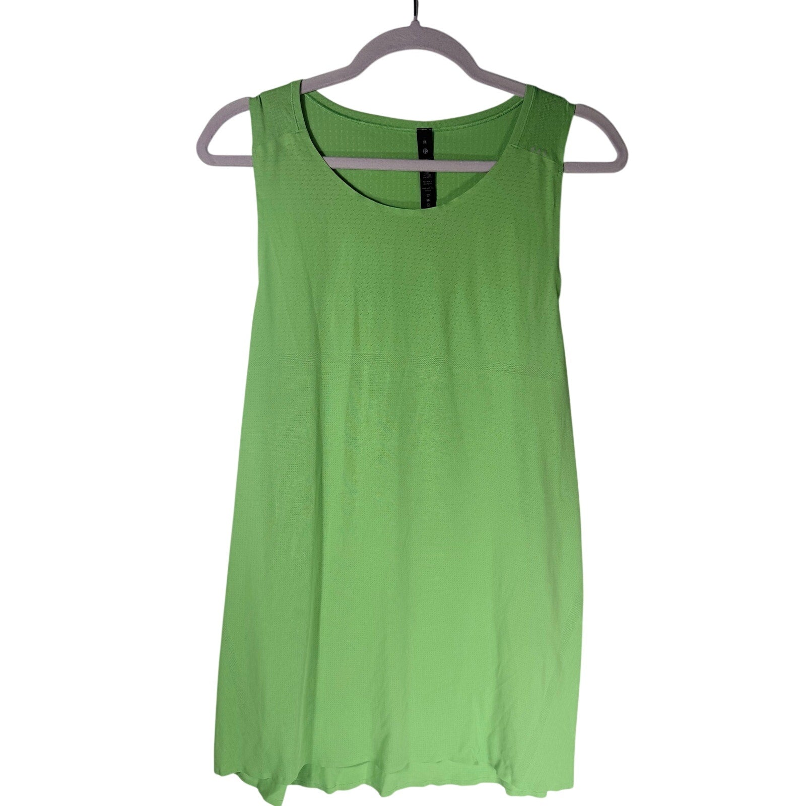 Lululemon women's lime green open-back athletic tank top, size XL, lightweight and breathable for active wear.
