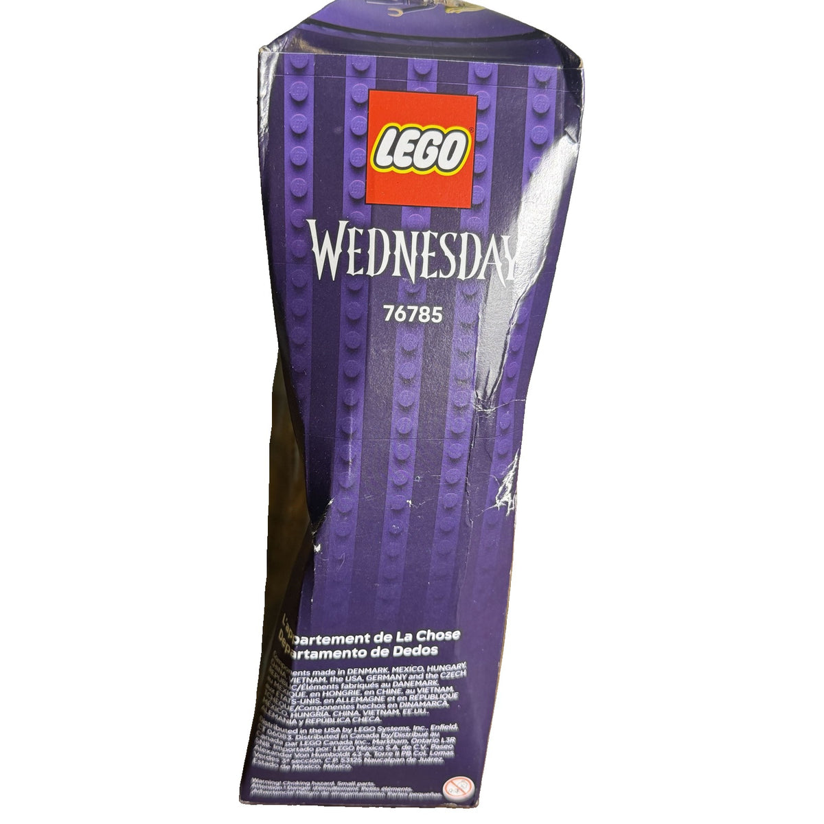 LEGO Wednesday Thing's Apartment building toy set 76785 with 828 pieces, featuring detailed LEGO construction and damaged box condition.