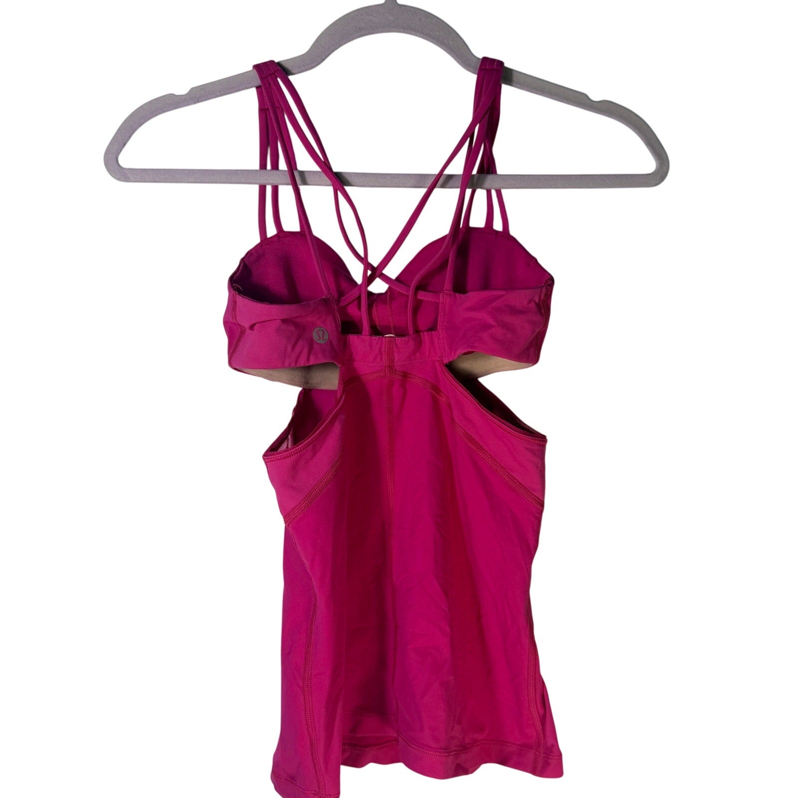 Lululemon women's magenta strappy cutout athletic tank top, size 2, pre-owned, with a fitted design and breathable fabric.