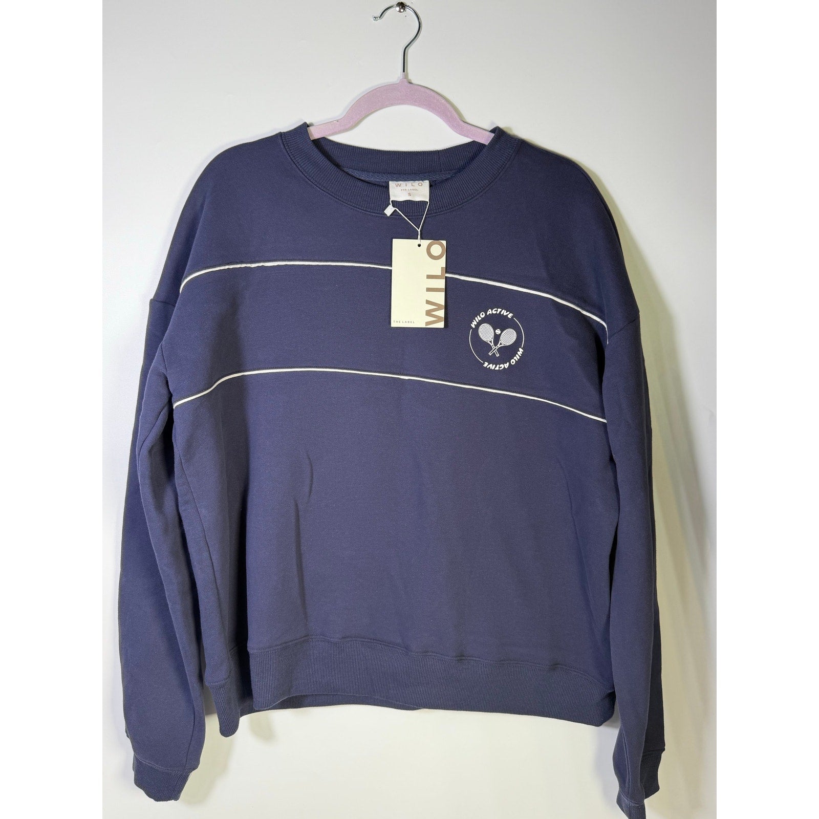 Wilo The Label women's navy 2-piece sweatshirt and leggings set, size small, featuring comfortable, stylish activewear.