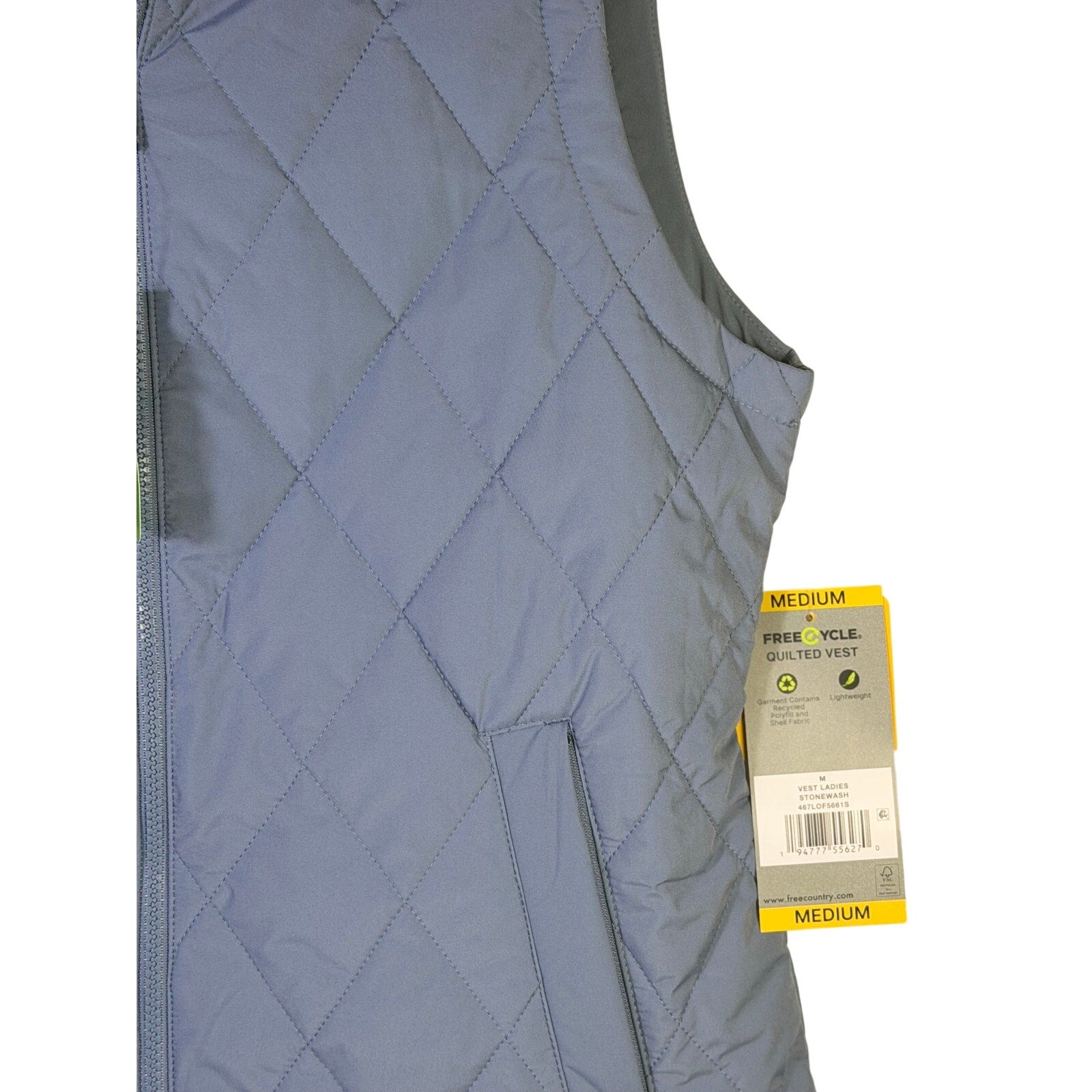 Free Country women's quilted vest in stonewash blue, size M, featuring a stylish, lightweight design perfect for layering.