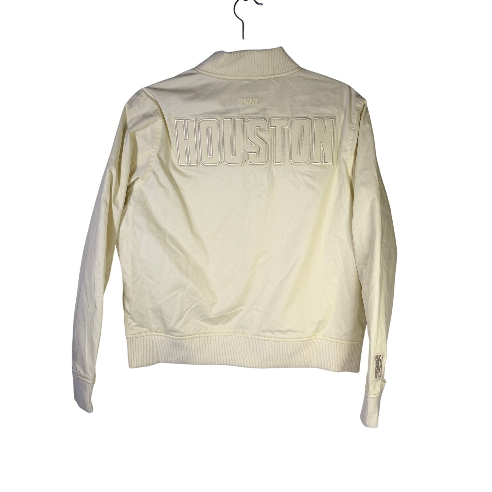 Pro Standard women's Houston Rockets cream bomber jacket, size small, showing front view with logo and quilted design.
