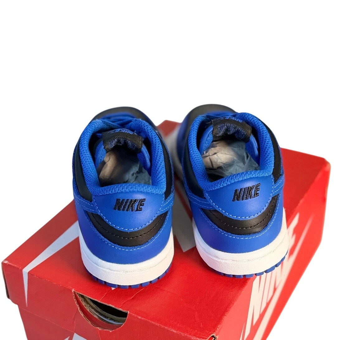 Nike Dunk Low GS Royal Blue and Black sneakers for kids, athletic shoes with stylish blue and black design and white sole.