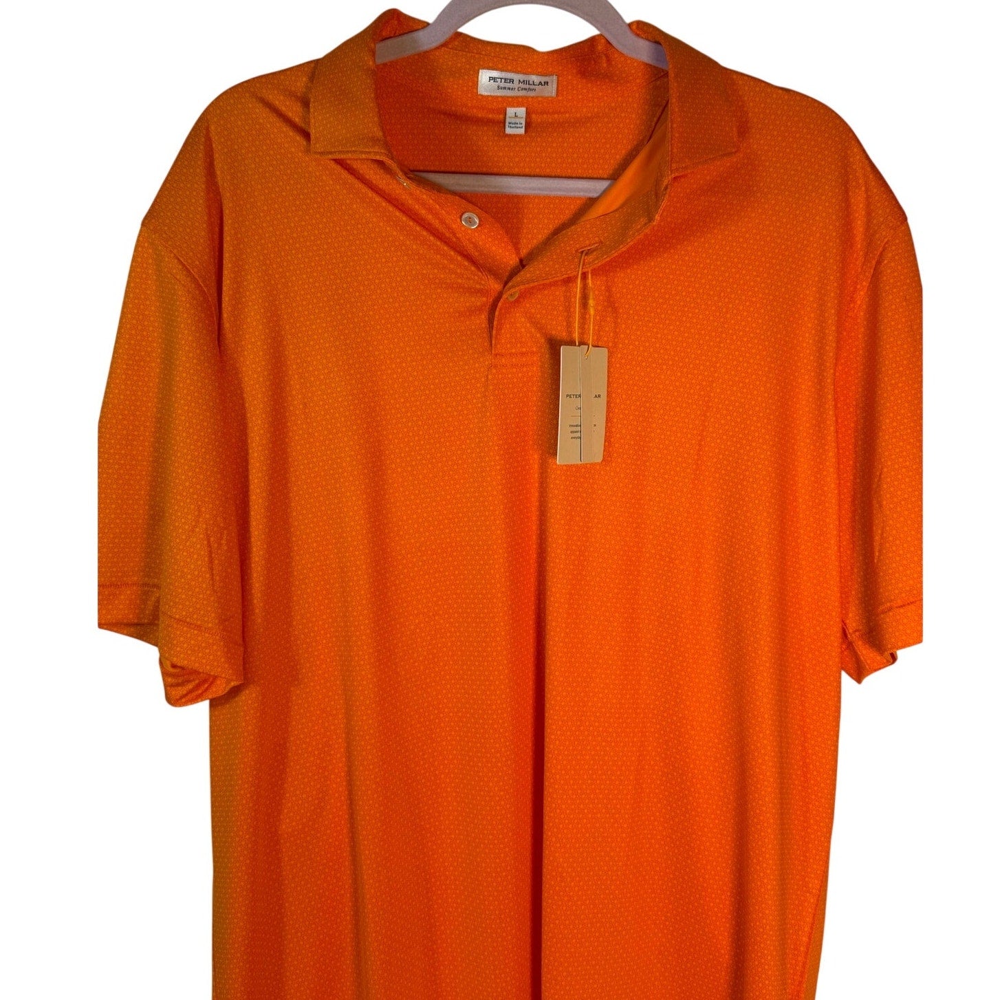 Nike Peter Millar summer orange polo shirt for men, size L, new with tags, stylish casual polo with short sleeves and collar.