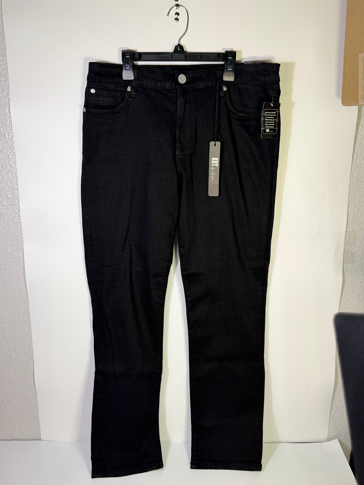 Black KUT from the Kloth straight leg jeans in size 12, showing the fit and classic denim texture.