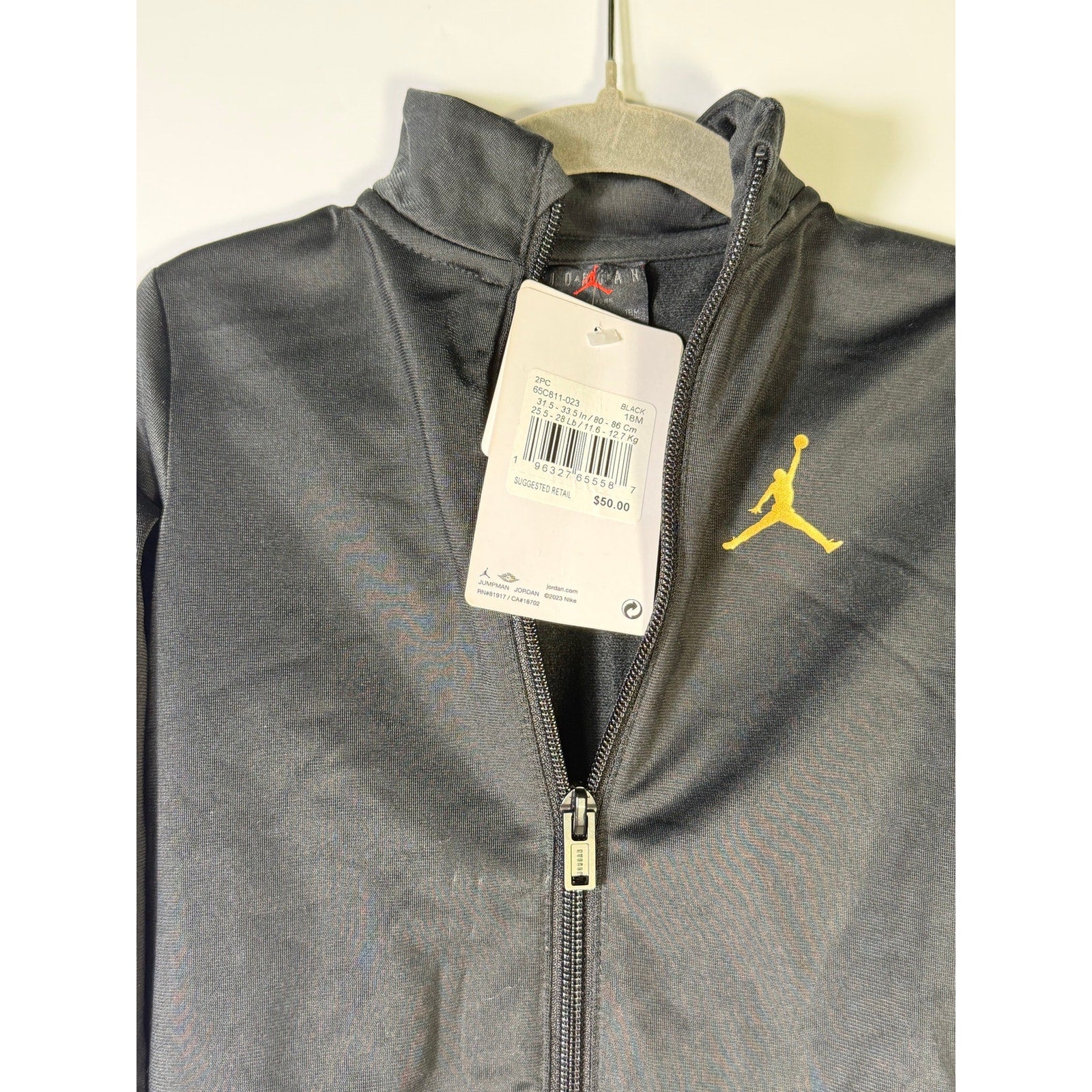 Jordan baby boys 2-piece black and gold track jacket and jogger set, size 18 months, new with tags.