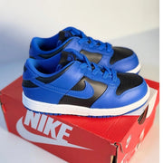 Nike Dunk Low kids' sneakers in size 10C, brand new, showing the colorful design and classic Nike branding on the shoes.