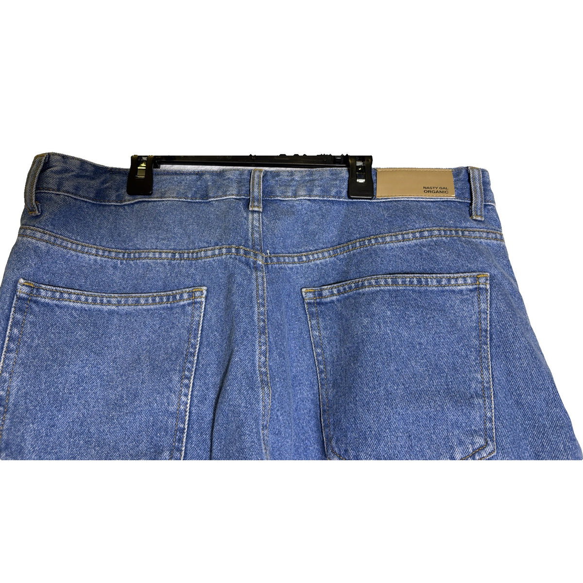 Light blue Nasty Gal organic denim mom jeans in plus size 14, front view showing high waist and relaxed fit.