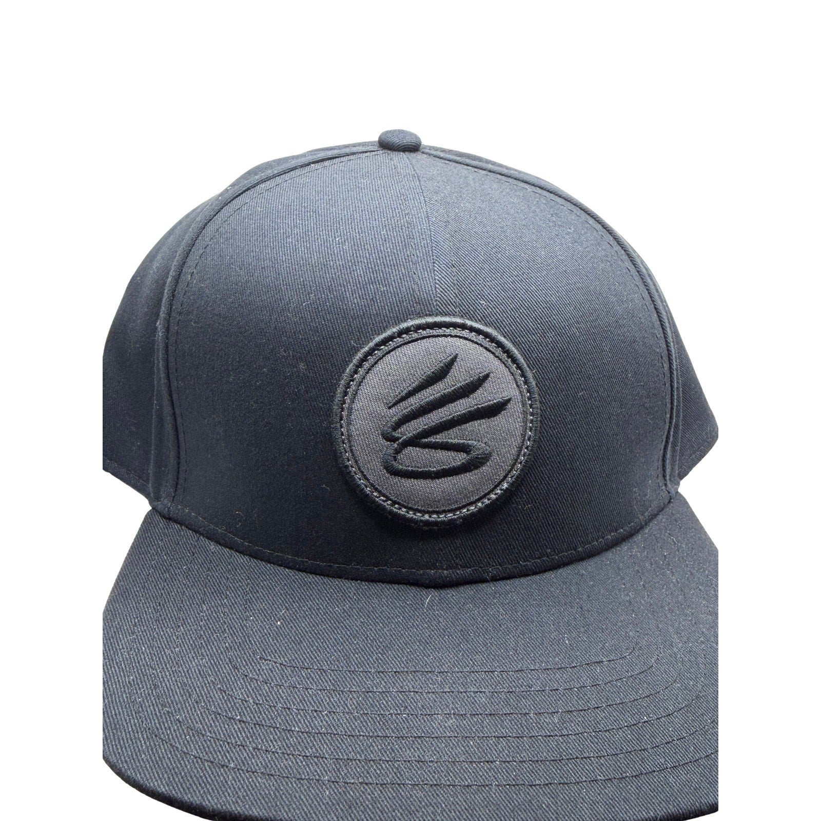 Black Curry Brand snapback hat, adjustable basketball cap, one size, new with tags, stylish headwear for sports and casual wear.