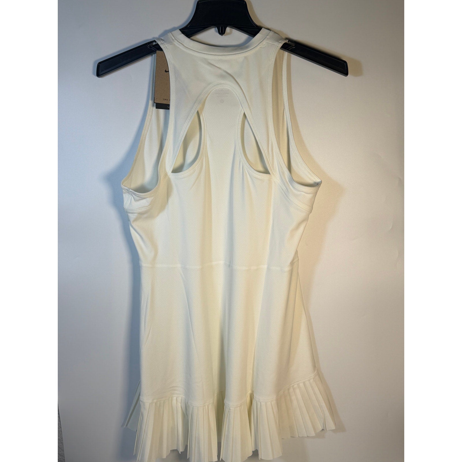 Nike Women's white Dri-FIT tennis dress, sleeveless, size XL, lightweight athletic dress for women.