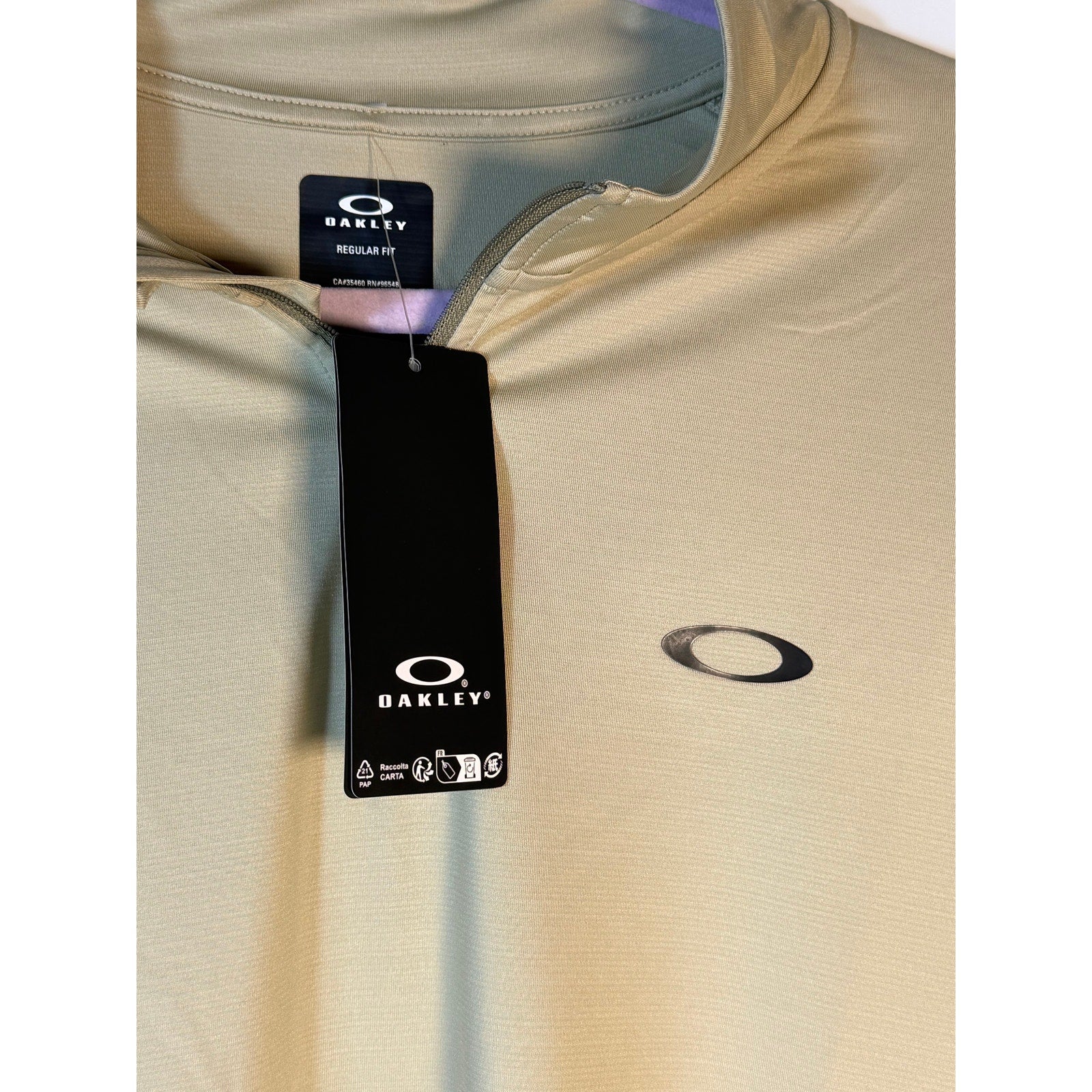 Under Armour Oakley Gravity Range quarter zip pullover in Silver Sage, XL regular fit, shown on a model.
