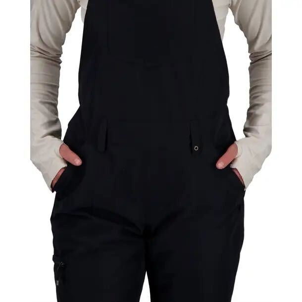 Obermeyer women's insulated ski snow bib overalls in black, size 8, showing the front view with adjustable straps and snow-resistant fabric.