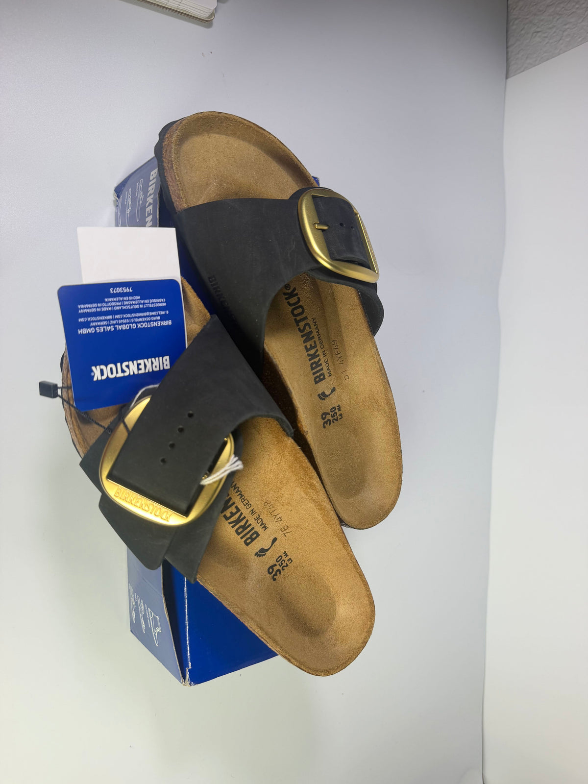 Black Birkenstock Madrid Big Buckle sandals for women, US size 8, featuring wide straps and a comfortable footbed.