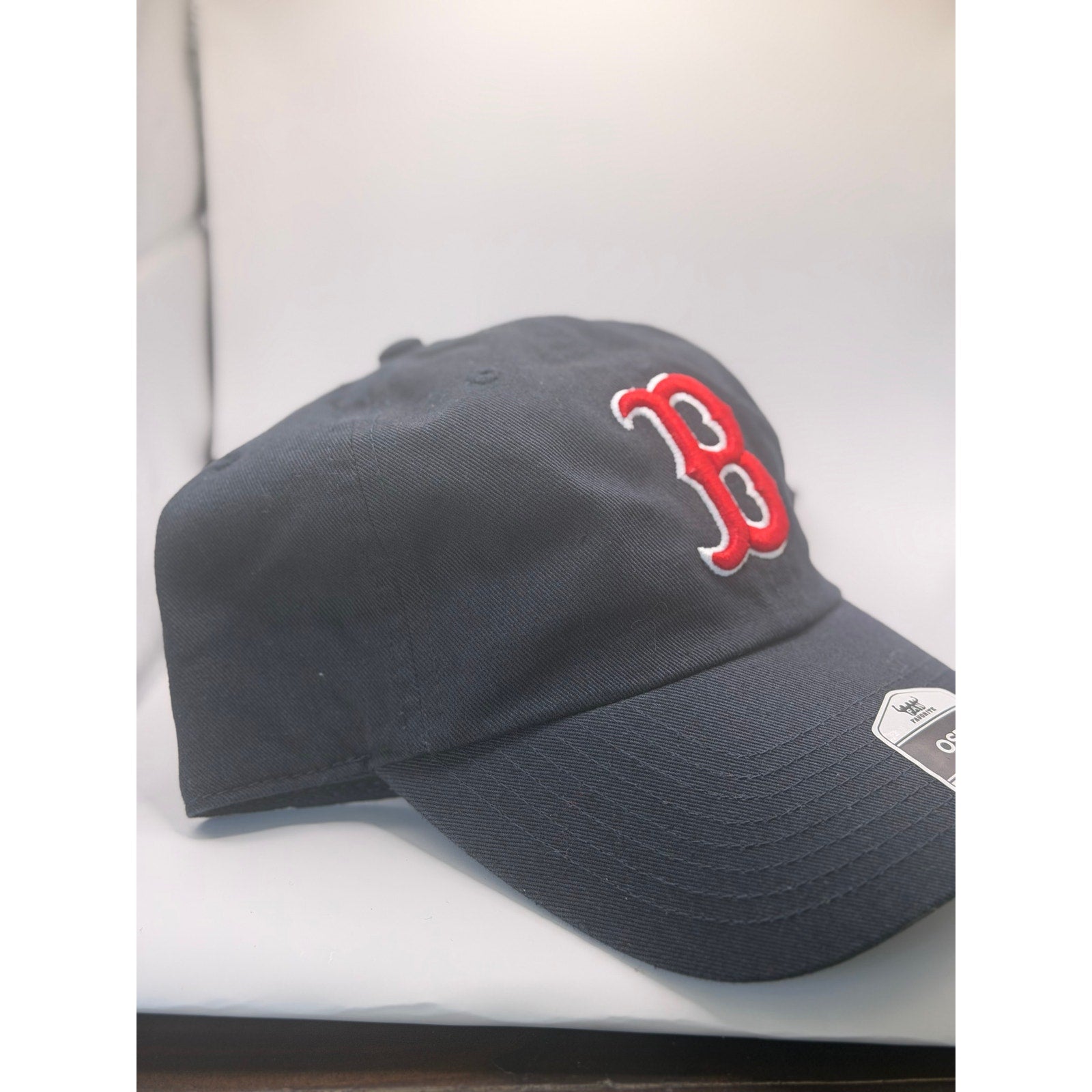 Black New Era Boston Red Sox MLB Clean Up adjustable dad hat with red logo, showcasing front view and adjustable strap