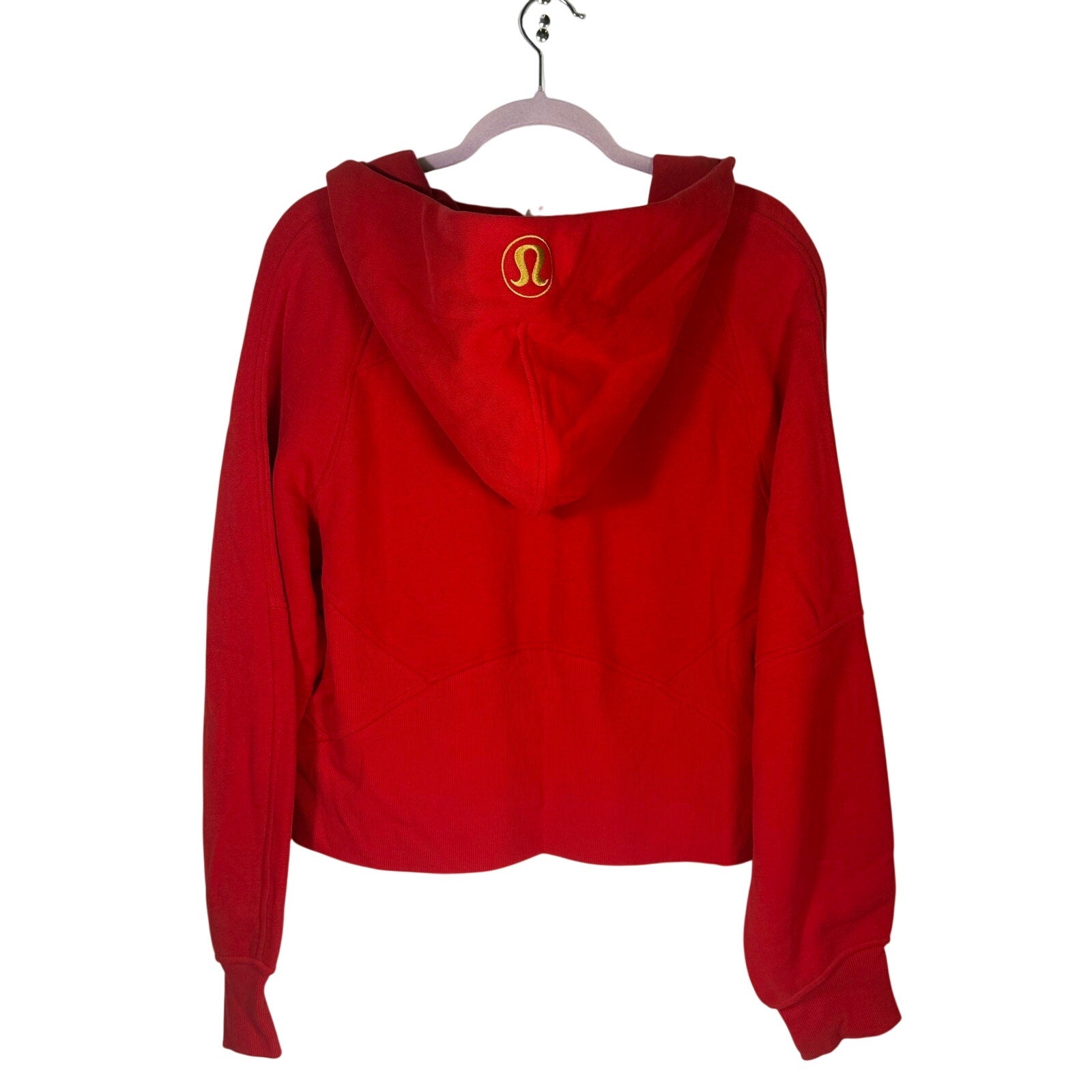 Lululemon women's red scuba oversized full zip hoodie with gold accents, size M/L, front view, new with tags.