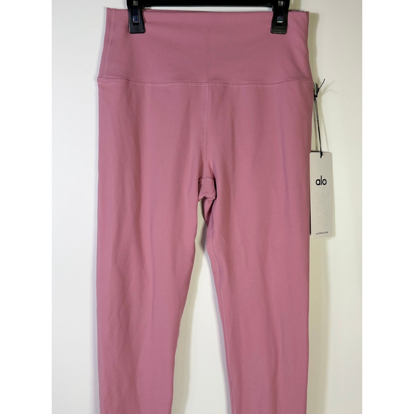 Alo Yoga 7/8 high-waist airbrush leggings in pink Wild Rose, women's size L, with a form-fitting design and smooth fabric.