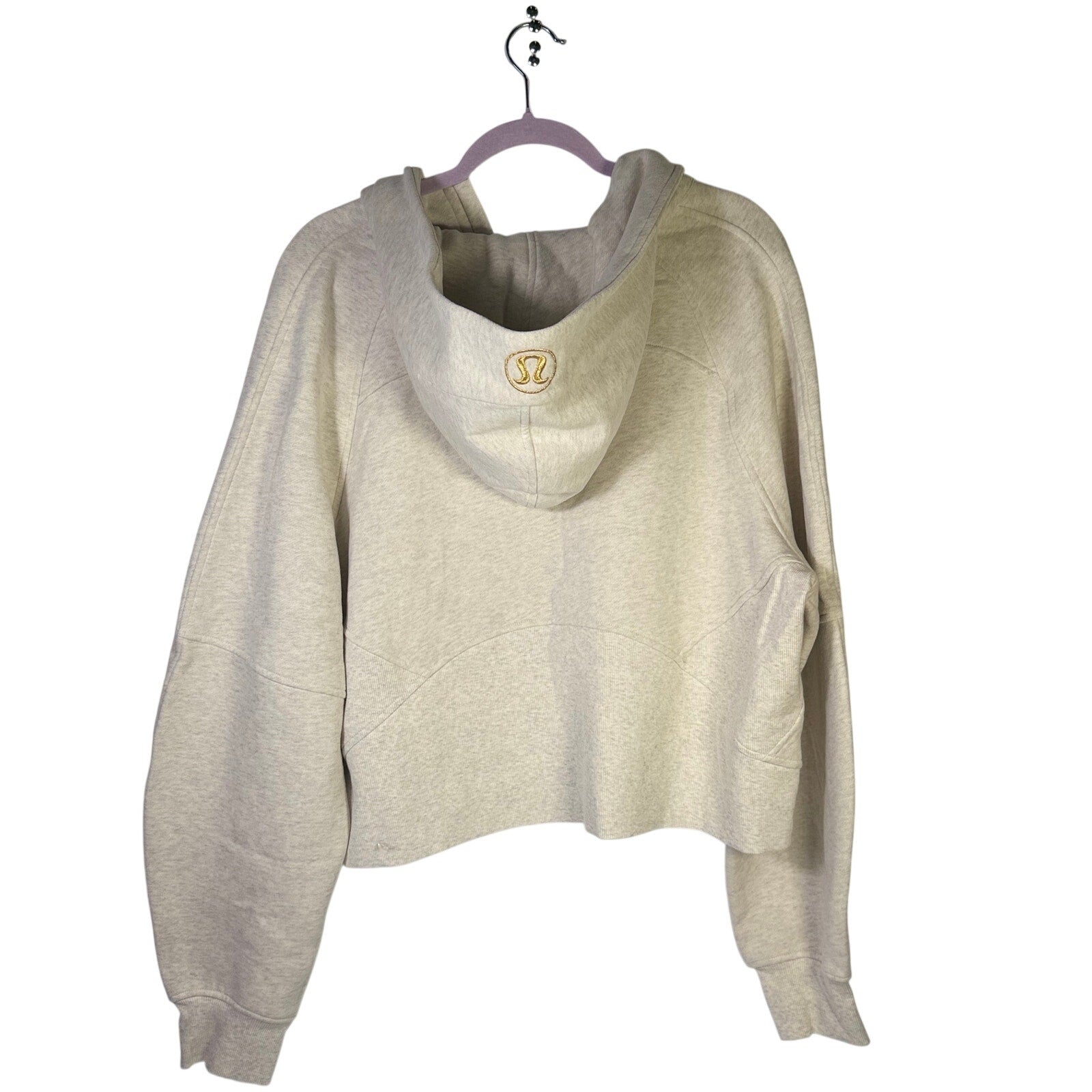 Lululemon Scuba oversized half-zip hoodie in heathered cream, size XL/XXL, with a relaxed fit and front half-zip closure.