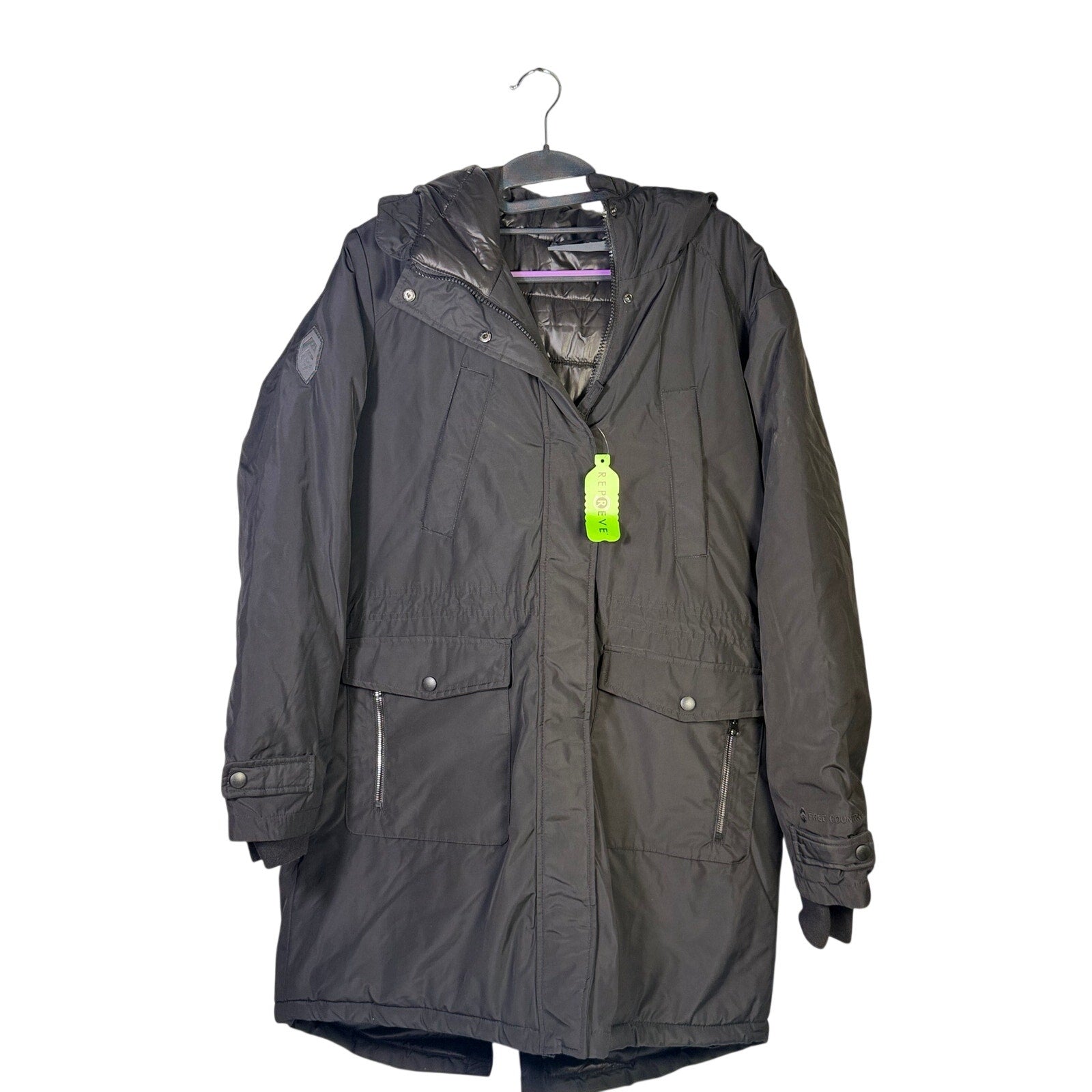 Black Free Country women's Arctic Series anorak jacket with hood, long coat style, suitable for cold weather outdoor wear.